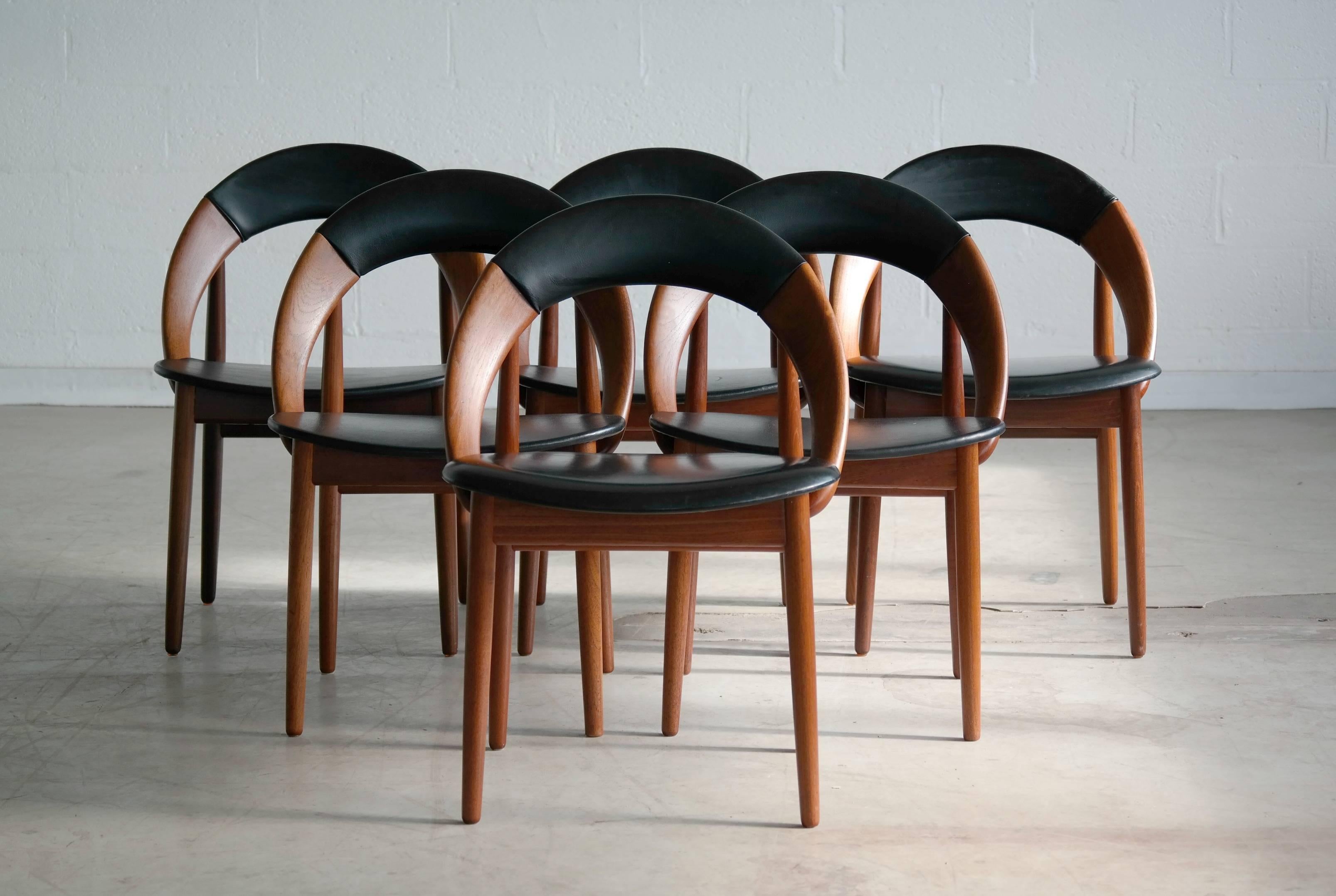 This is a very hard to find set of six iconic dining chairs designed by Arne Hovmand-Olsen. This highly coveted design is often found as a single chair or even in pairs but rarely in full sets. This is the only set offered on 1stdibs currently. The