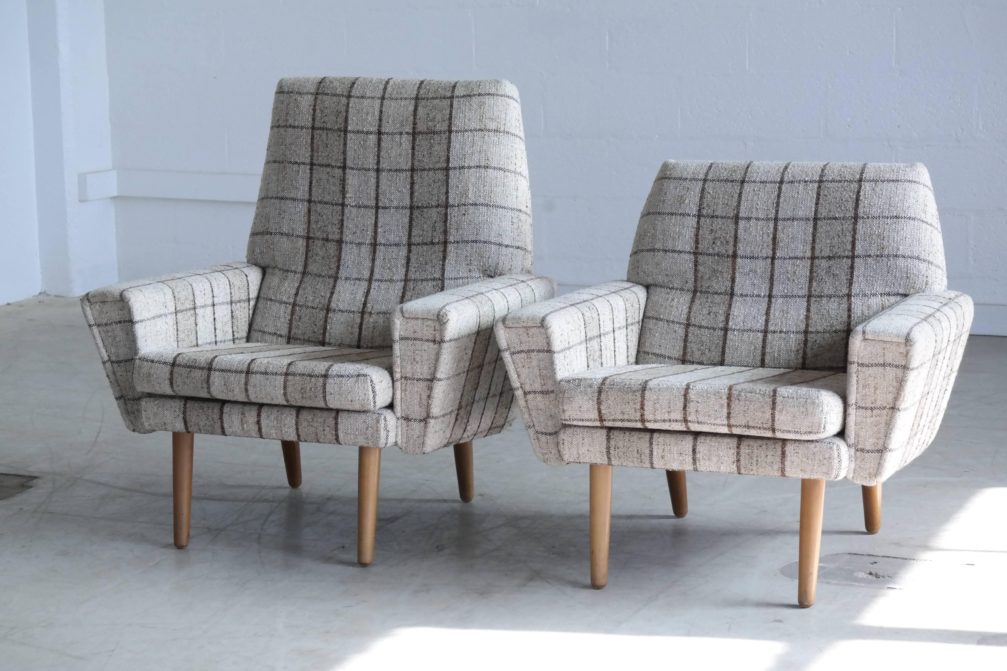 High and low back lounge chairs in the style of Kurt Østervig, 1960s. Cool still in its original wool fabric. Excellent condition. 