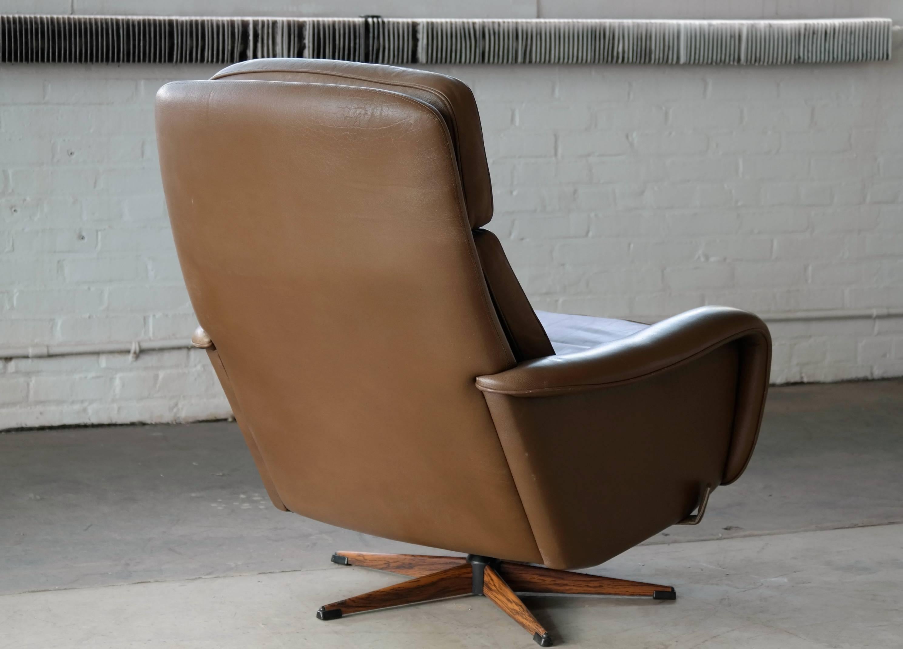Late 20th Century Danish Mid-Century Leather Swivel Lounge Chair with Ottoman by Madsen & Schubel