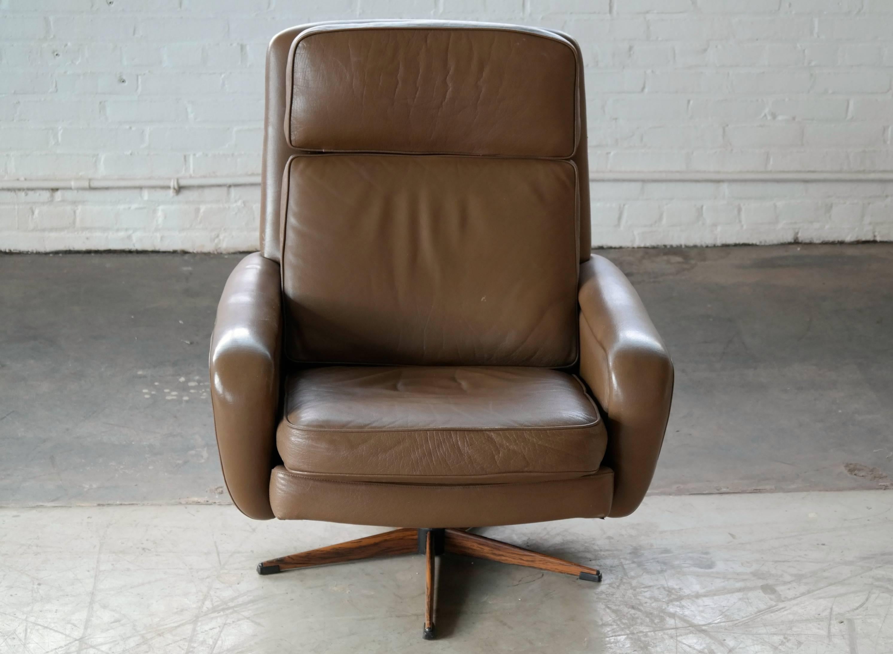 Danish Mid-Century Leather Swivel Lounge Chair with Ottoman by Madsen & Schubel In Excellent Condition In Bridgeport, CT