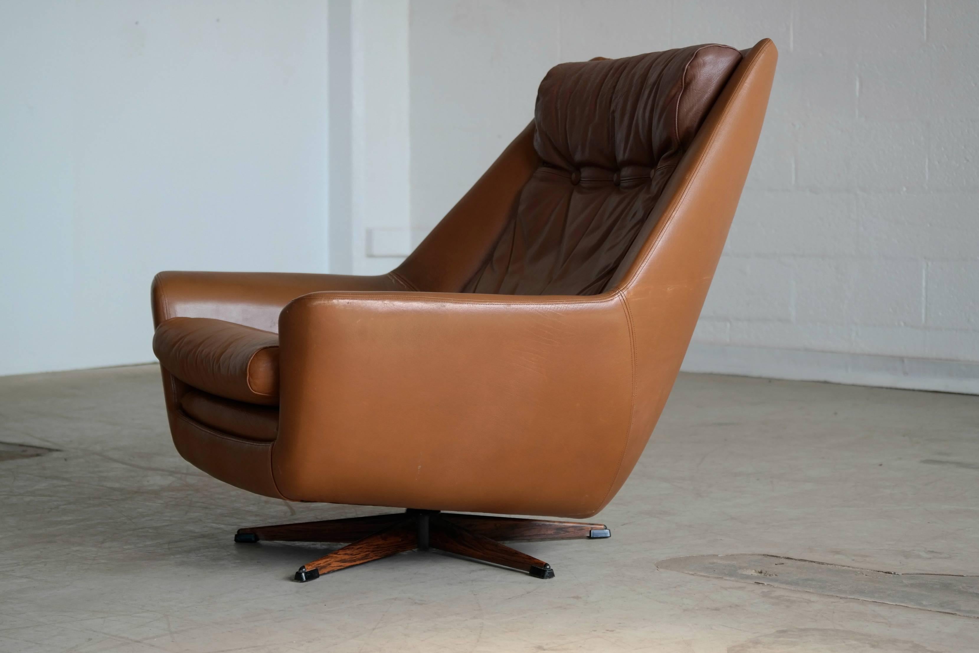 Kurt Ostervig Style Cognac Leather Lounge Chair with Ottoman and Swivel Base In Good Condition In Bridgeport, CT