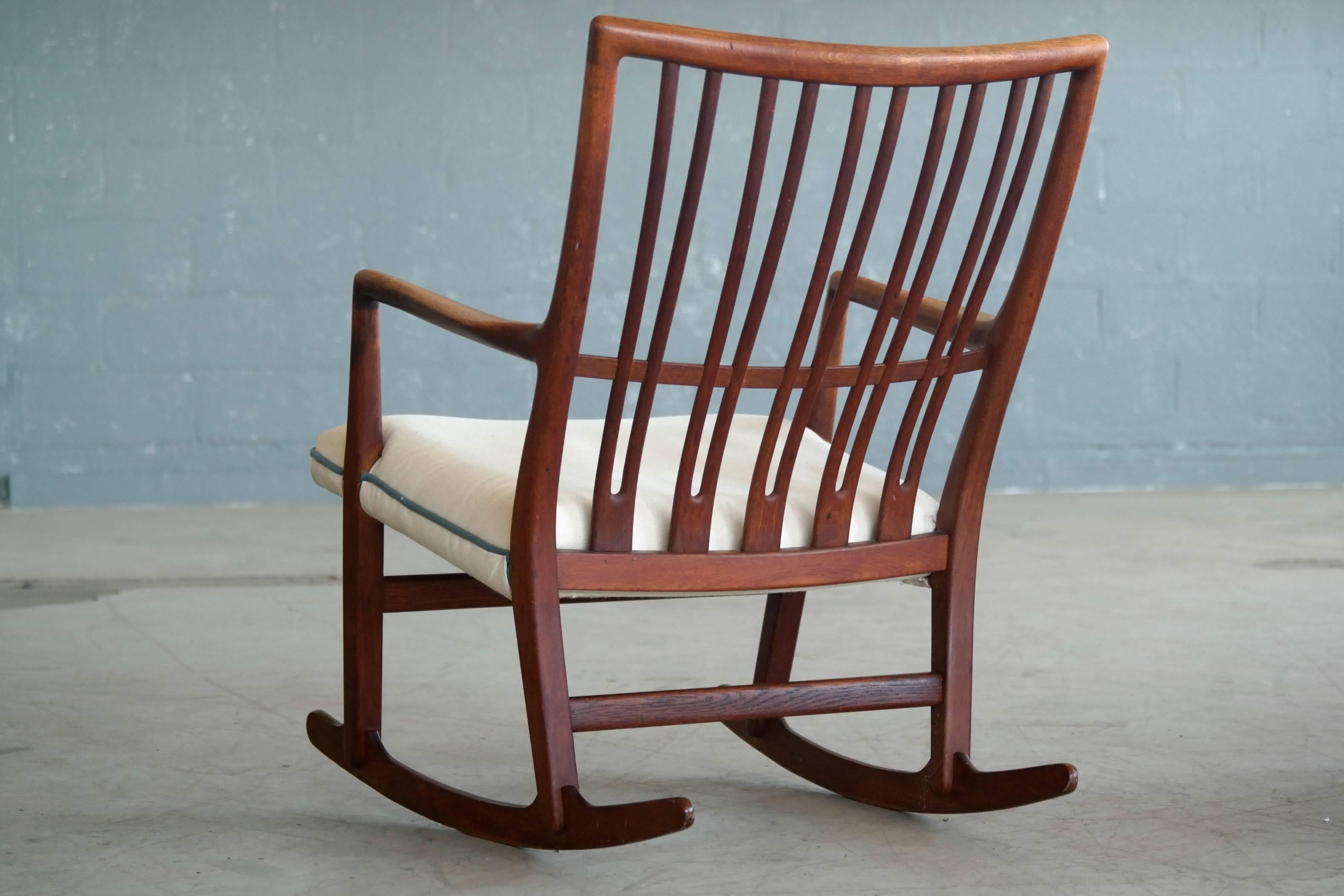 One of the few collaborations between Hans Wegner and Master Cabinetmaker, Mikael Laursen the ML-33 rocker was designed and presented to the public in 1942. Mostly found in oak and beech wood we believe this more rare teak version was made in the
