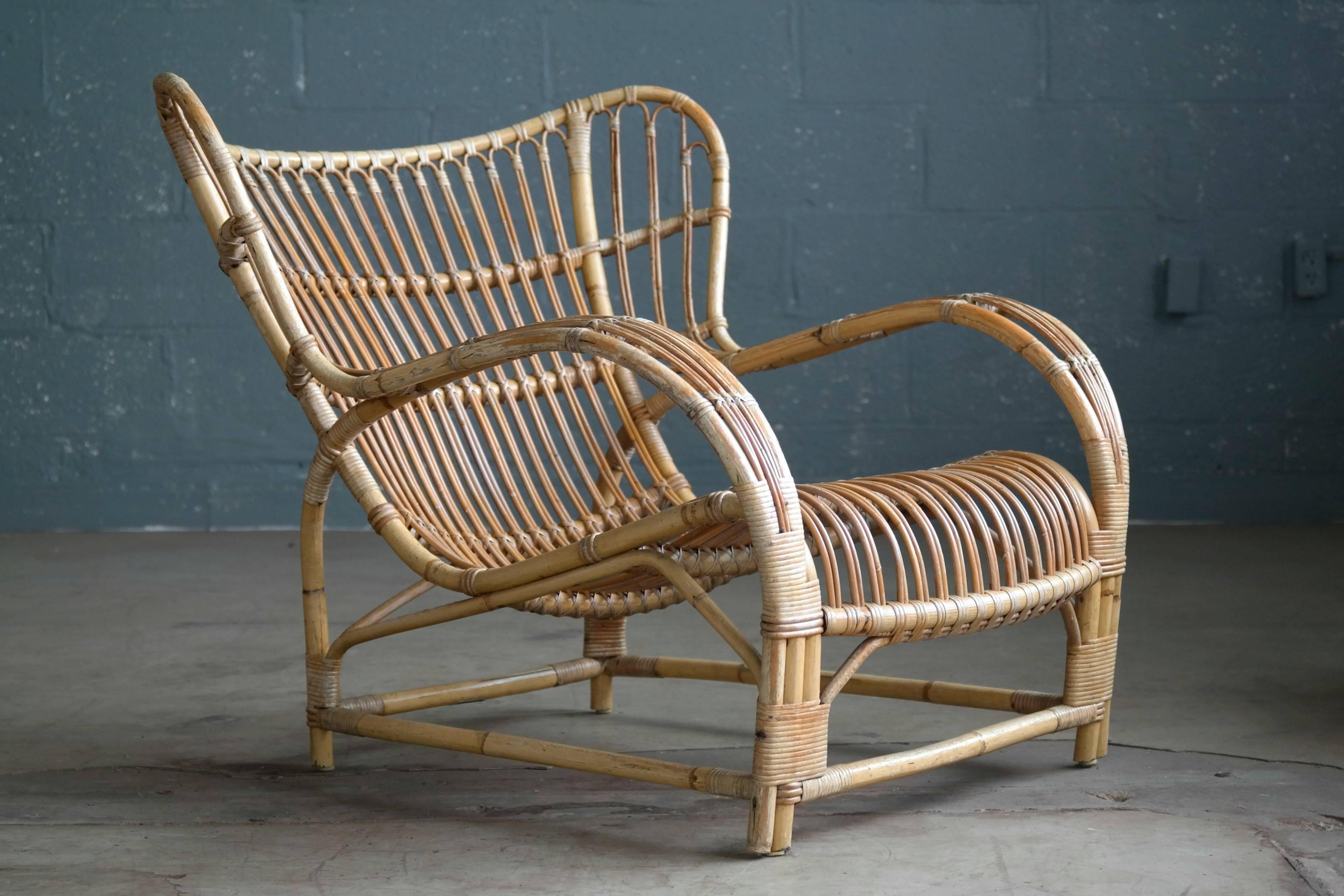 Very rare and sought after Viggo Boesen designed rattan lounge chair model VB 136 for E.V.A. Nissen. Designed in 1936 and most likely manufactured around that time. The chairs till carries the maker's plaque. 

While Boesen's rattan designs has