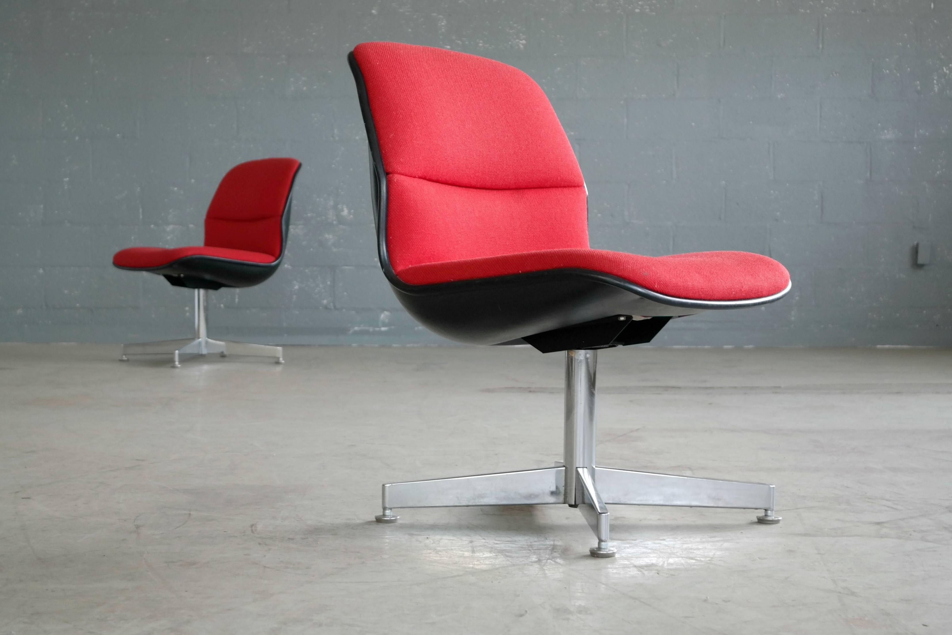 Super cool and equally comfortable pair of conference or desk chairs from Chrome Craft probably late 1970s. Came out of the offices of J. Walter Thompson of New York. Solid and sturdy, wool in a vibrant red color in excellent condition.

 