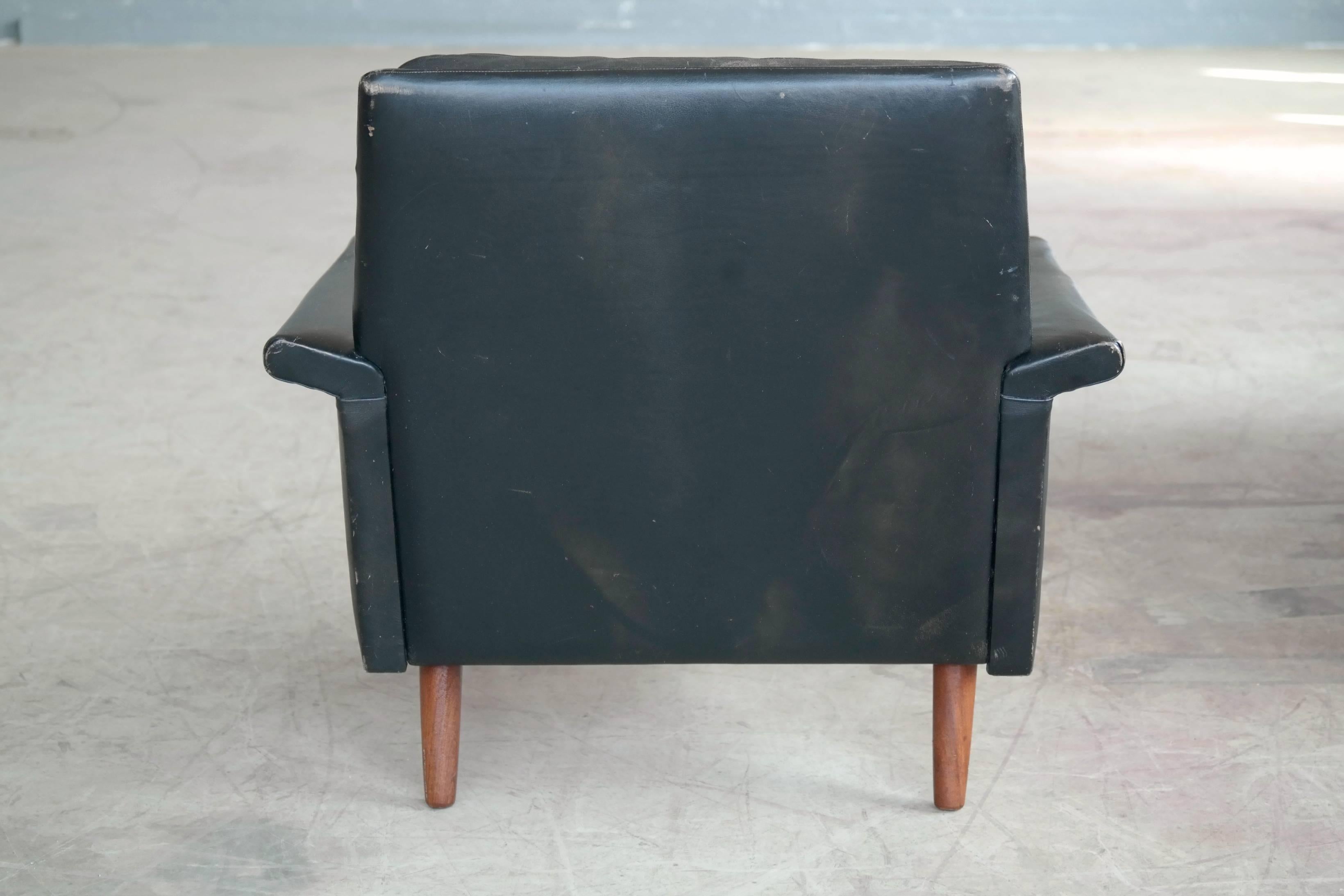 Illum Wikkelsø Style Easy Chair in Black Leather and Teak Denmark, 1960s 1
