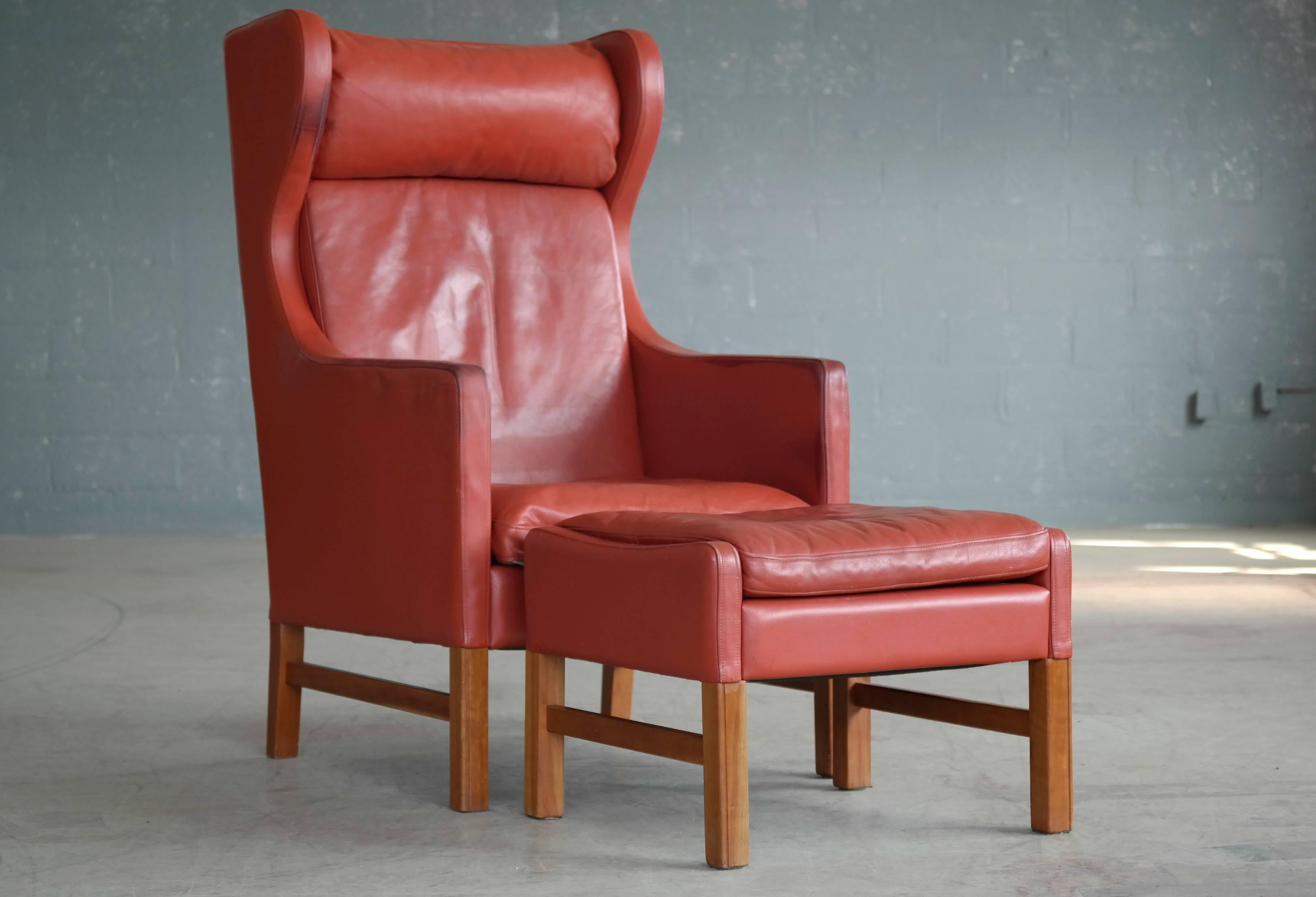 Mid-Century Modern Svend Skipper Danish Wingback Armchair and Ottoman Model Admiral in Red Leather 