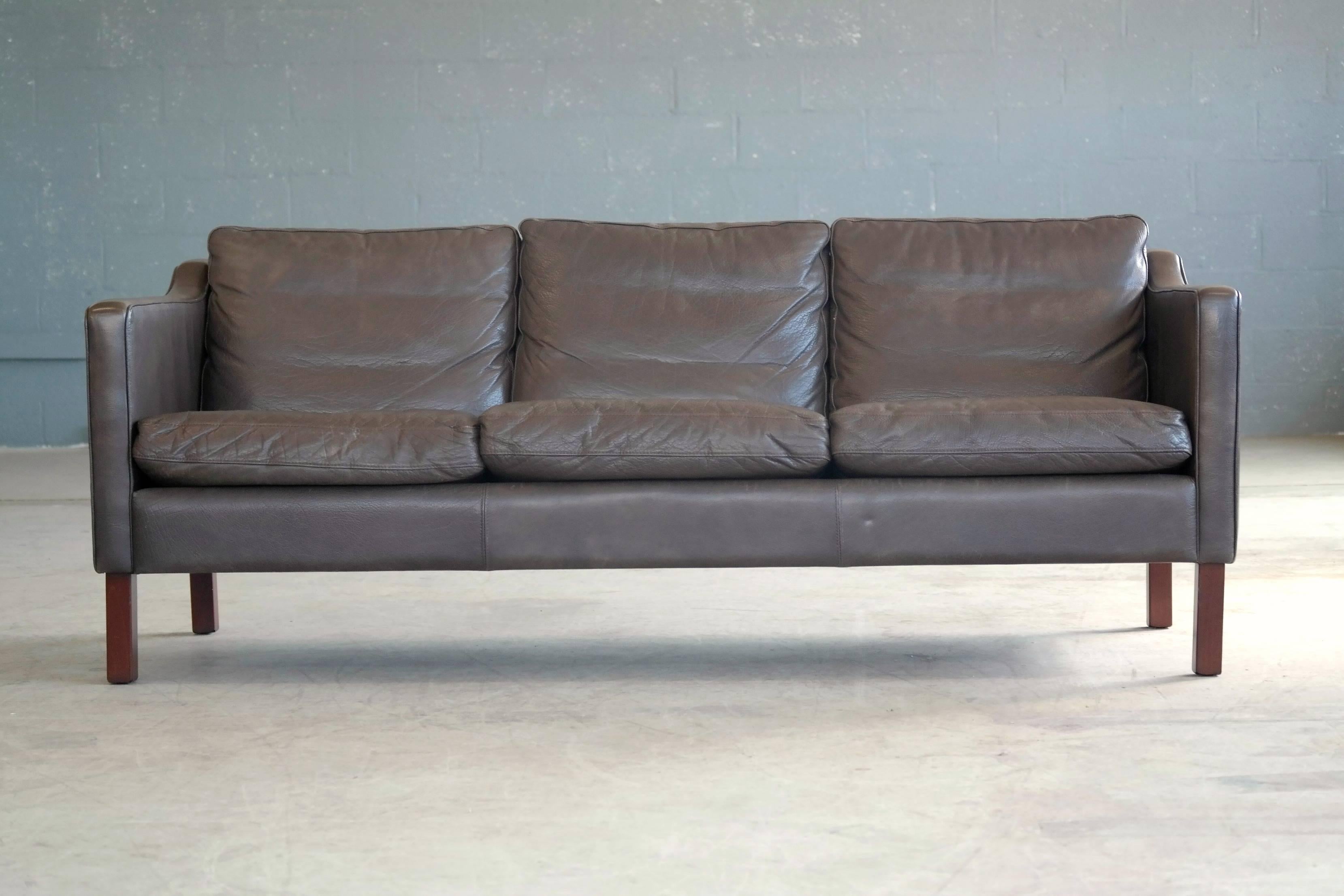 Classic Børge Mogensen style sofa from the late 1960s by Mogens Hansen. The epitome of Danish modern elegance. Nice color and great patina. Down filled cushions. Overall very good condition.
