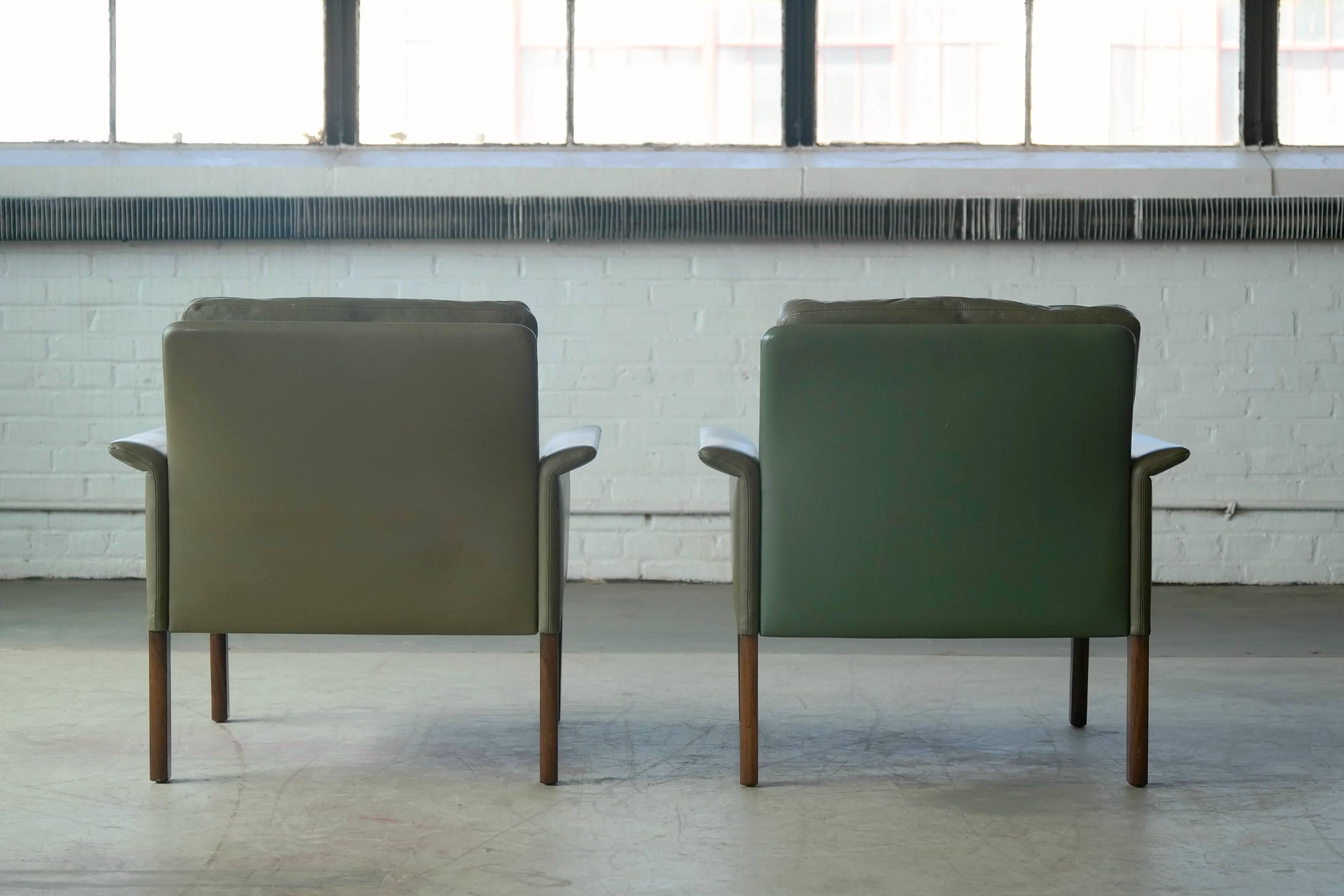 Mid-20th Century Hans Olsen Pair of Green Leather and Rosewood Lounge Chairs with Ottomans