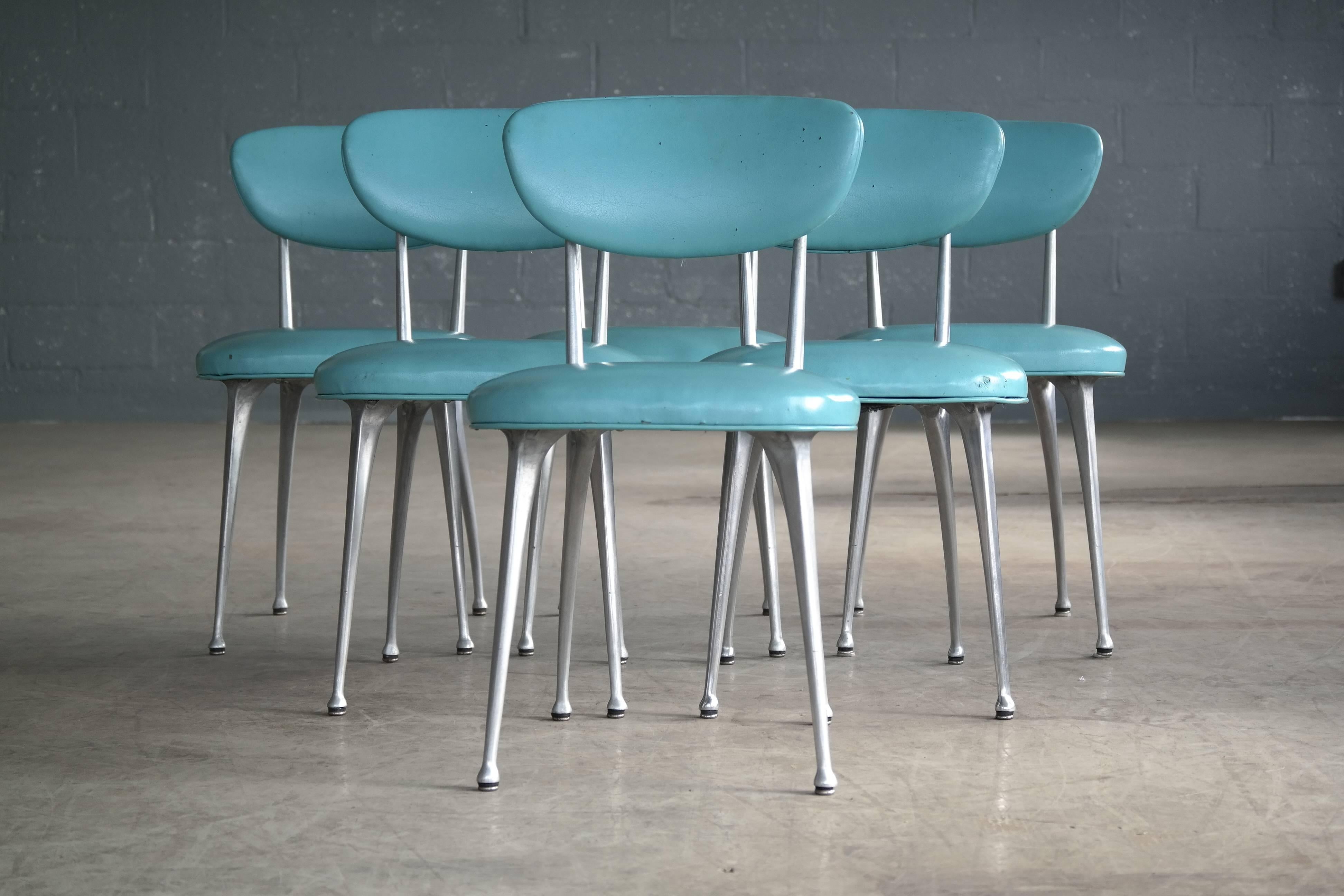 Striking classic modern and increasingly sought Gazelle dining chairs made by Shelby Williams in the 1950s. Perfect for turning your dining area or kitchen into your own private midcentury diner. The aluminum bases are in excellent condition while