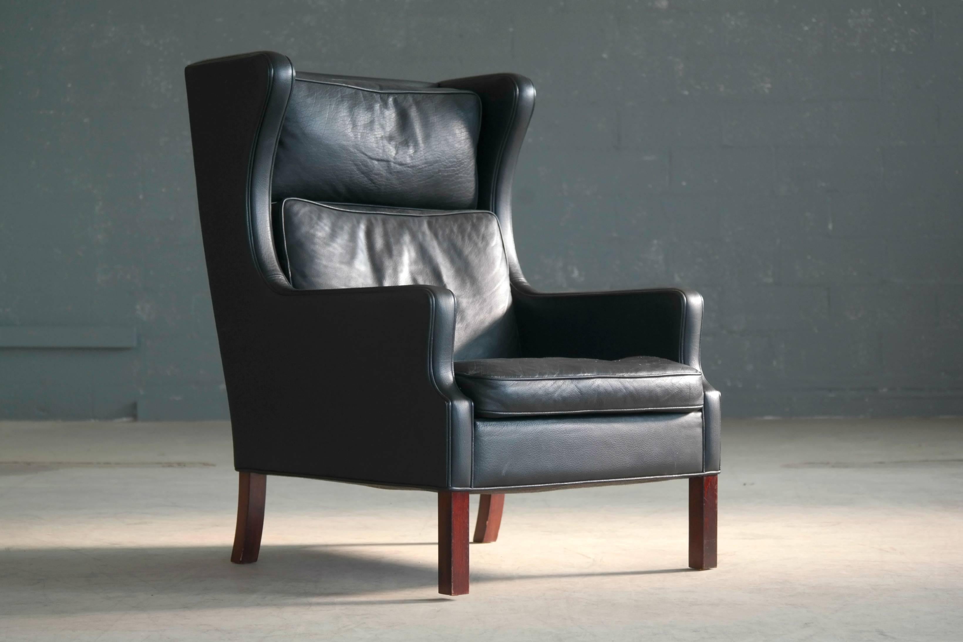 Danish Borge Mogensen Style High Back Lounge Chair and Ottoman in Black Leather