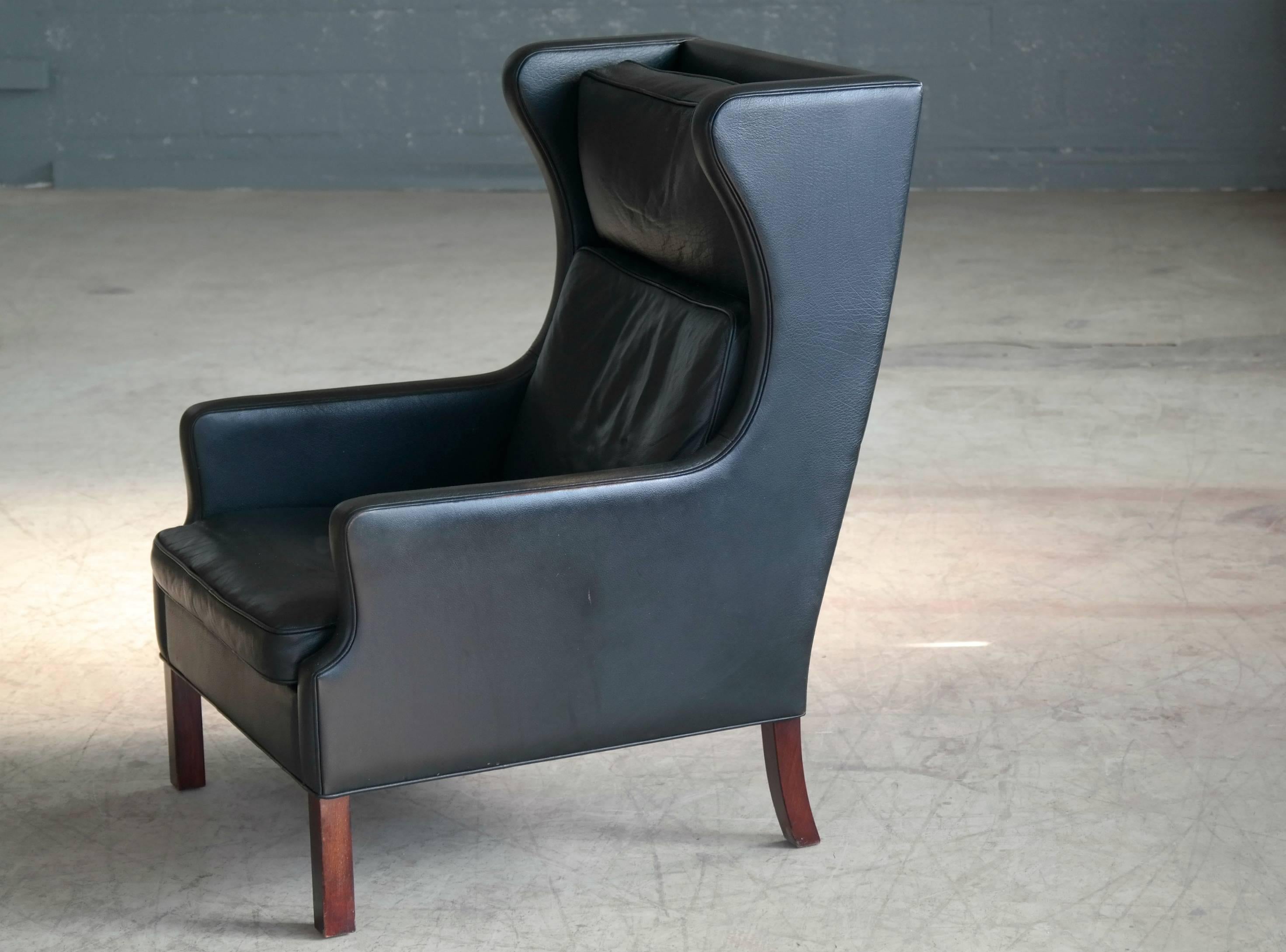 Mid-20th Century Borge Mogensen Style High Back Lounge Chair and Ottoman in Black Leather