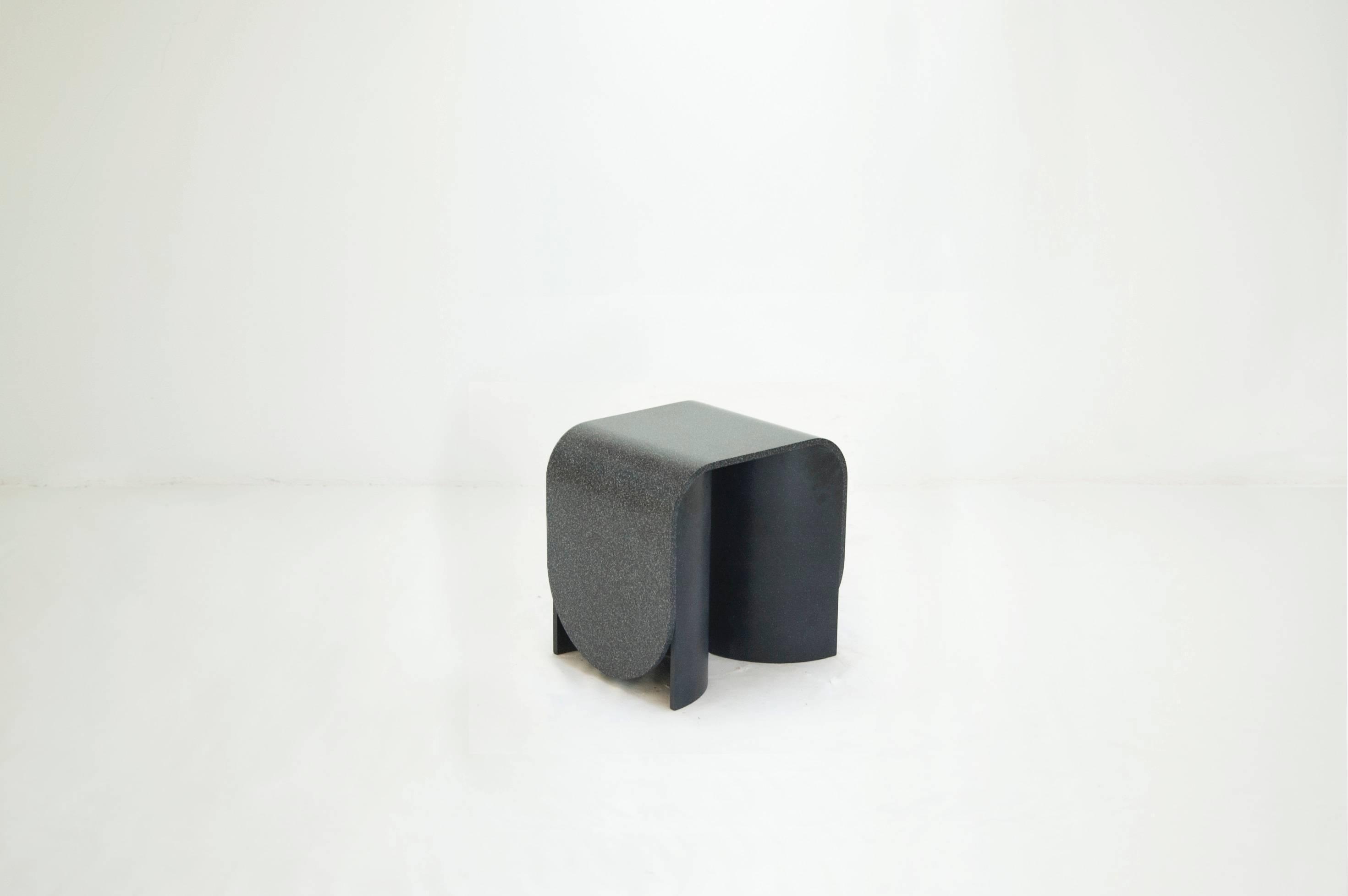 Stool series “Arc”.
The Netherlands, 2015.

Naturally formed stone is not malleable or pourable so only through the removal of material one can create forms. The use of Hi-Macs material allows for the same properties of stone because it is just