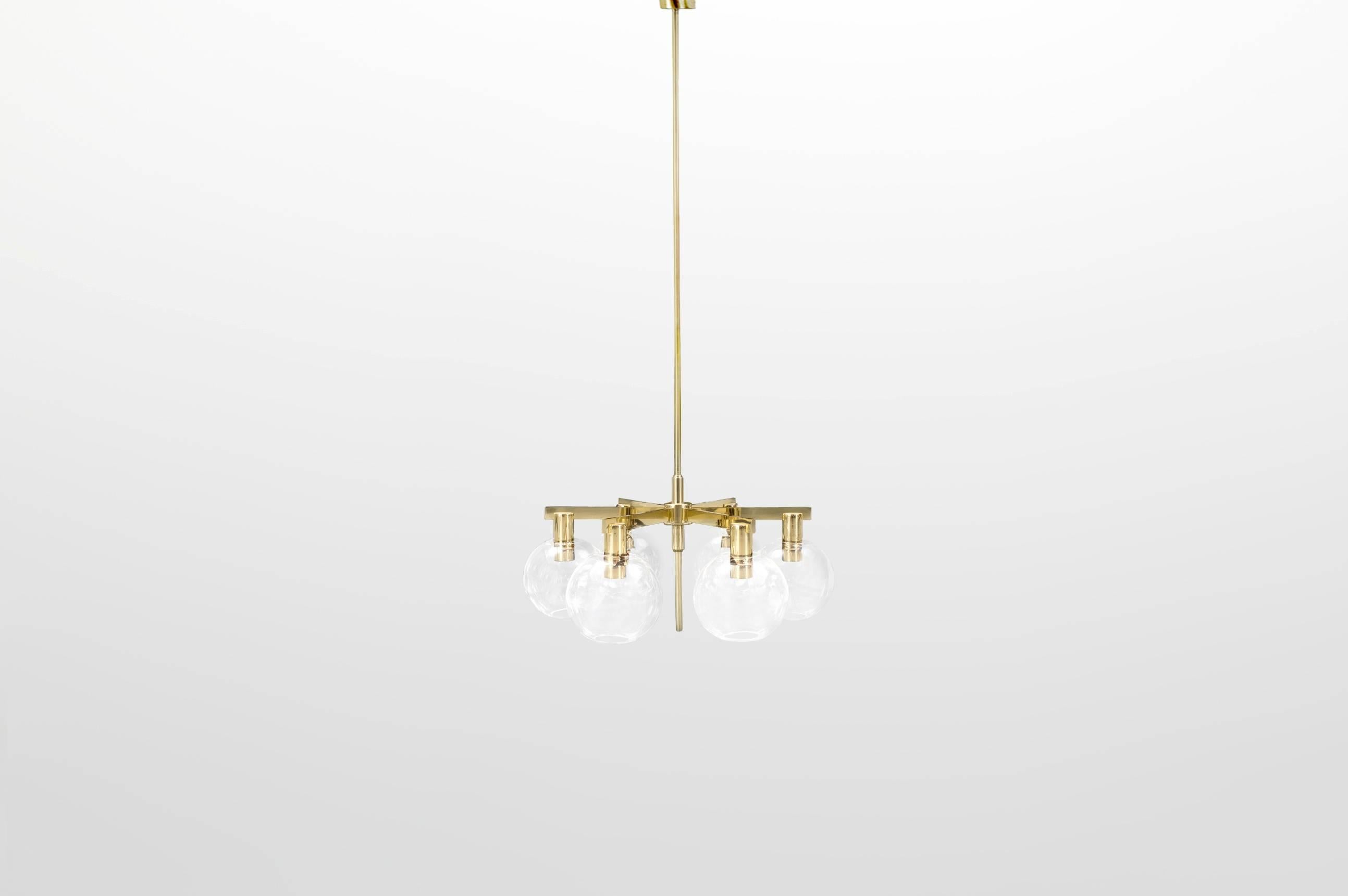 Hans-Agne Jakobsson (1919-2009).

Pair of ceiling lamp, model “T348/6 Pastoral.”
Manufactured by Hans-Agne Jakobsson AB.
Markaryd, Sweden, 1959.
Brass and blown glass.
Ceiling Lamp Pendants