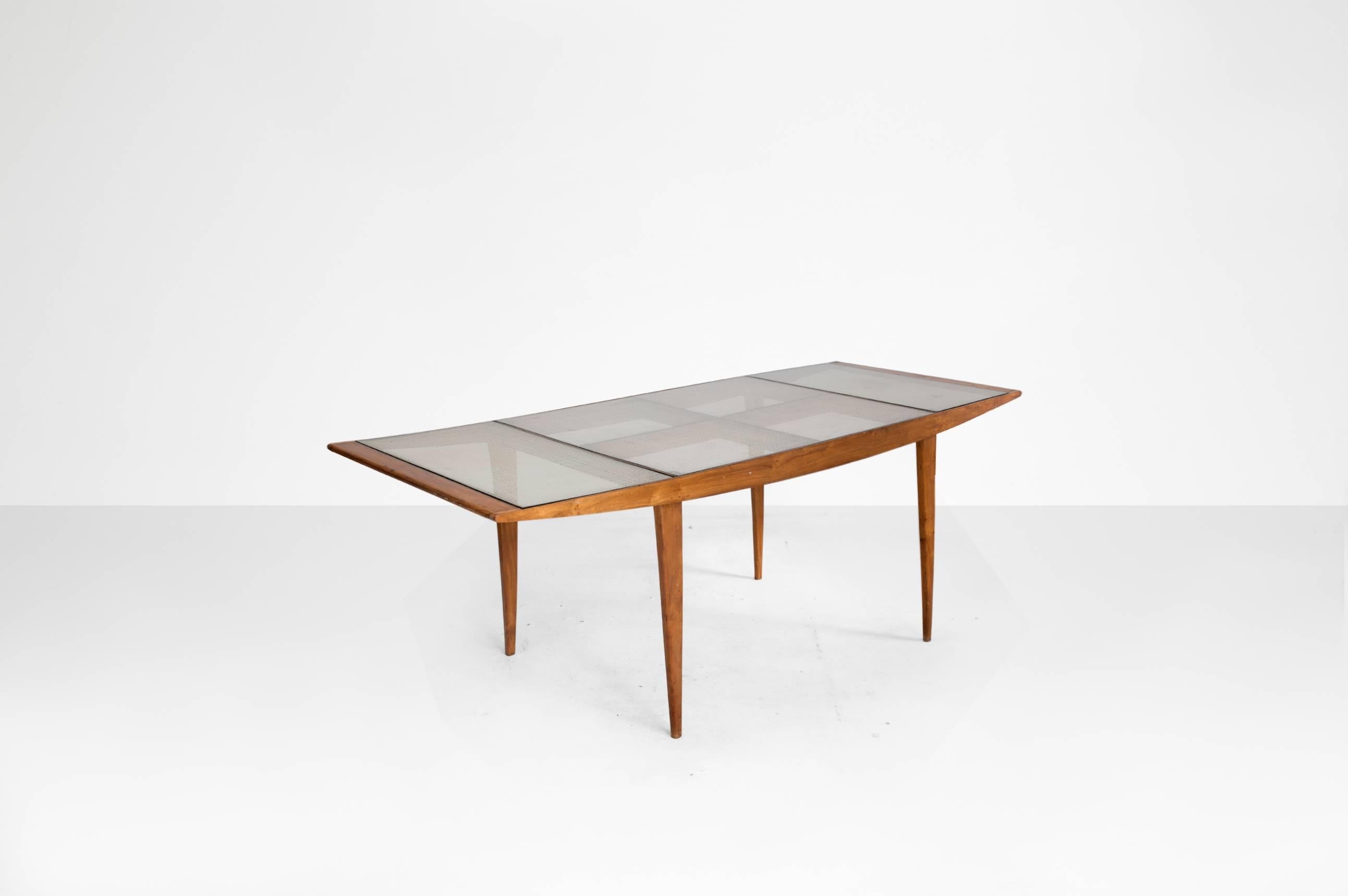 Martin Eisler (1913-1977) & Carlos Hauner (1927-1997)

Dining table
Manufactured by Forma Moveis
Brazil, 1950
Caviuna wood, cane, glass top

Measurements
220 cm x 89 cm x 74 H cm.
88,6 in x 36 in x 29.5 H in

Literature
Aric Chen, Brazil