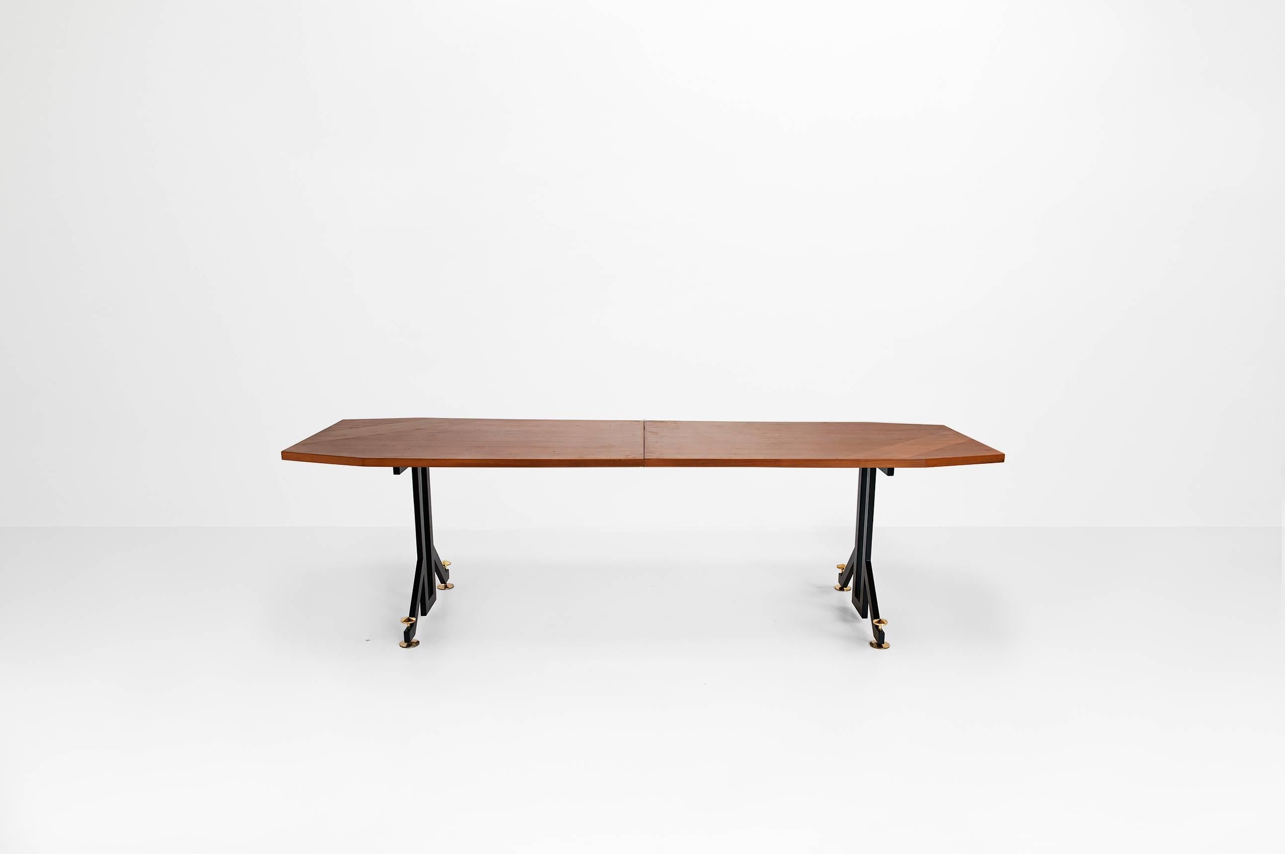 Anonymous

Extendable dining table
Manufactured by Florit
Italy, 1950
Palissandro wood, metal legs and brass details

Measurements
281 cm x 85 cm x 81 H cm (331 cm extendable)
110.6 in x 33.4 in x 31.8 H in (130.3 in