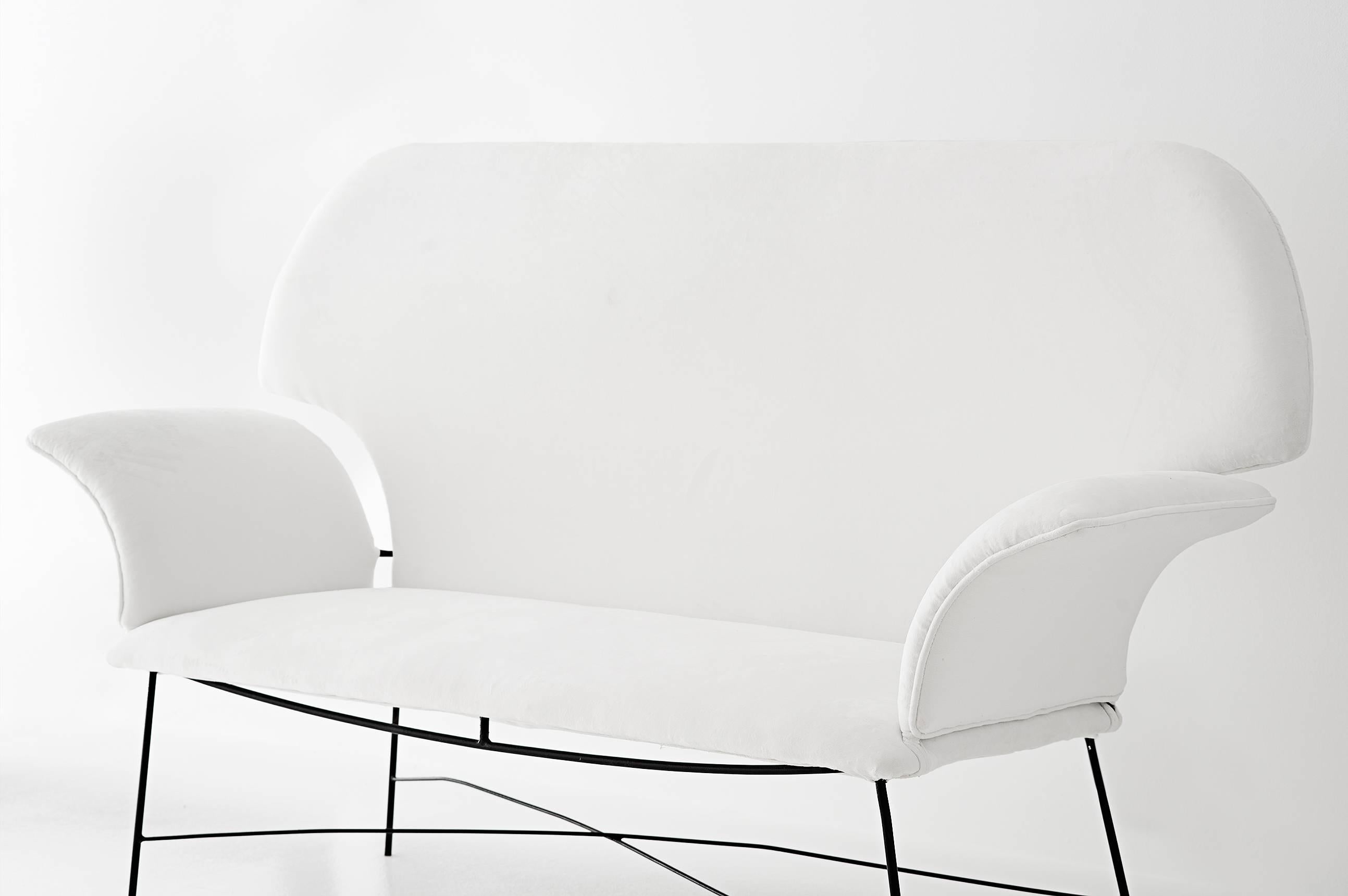 Martin Eisler (1913-1977) and Carlo Hauner (1927-1997)

Sofa
Manufactured by Forma Moveis
Brazil, 1950s
Black painted metal, white/cream fabric upholstery

Measurements:
170 cm x 64 cm x 110 H cm.
67 in x 25.2 in x 43.3 H in.

Literature
Brazil