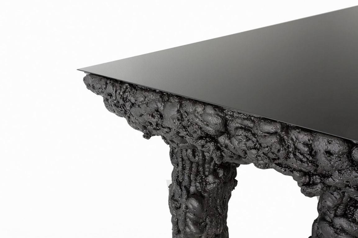 Guillermo Santomá

Black Dining Table 
Side gallery edition
Manufactured by Guillermo Santomá
Barcelona, 2016
Projected polyurethane, wooden structure, glass top

Measurements
320 cm x 90 cm x 78 h cm
126 in x 35,5 in x 30,7 h in.

Details
Unique
