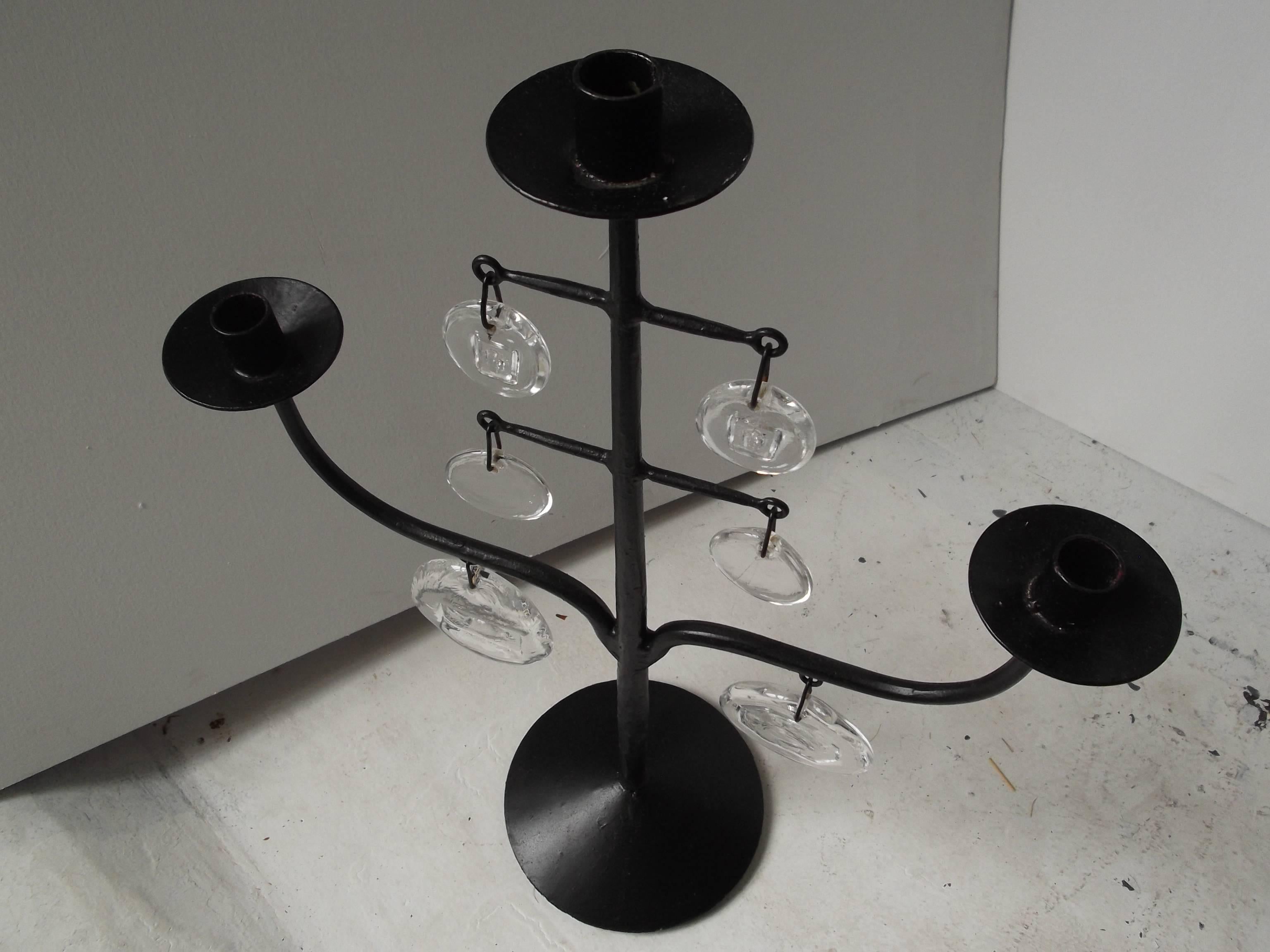 This is a wonderful candelabra by Erik Hoglund for Kosta Boda. It is a vintage piece from the 1960s era. It stands quite tall at 23