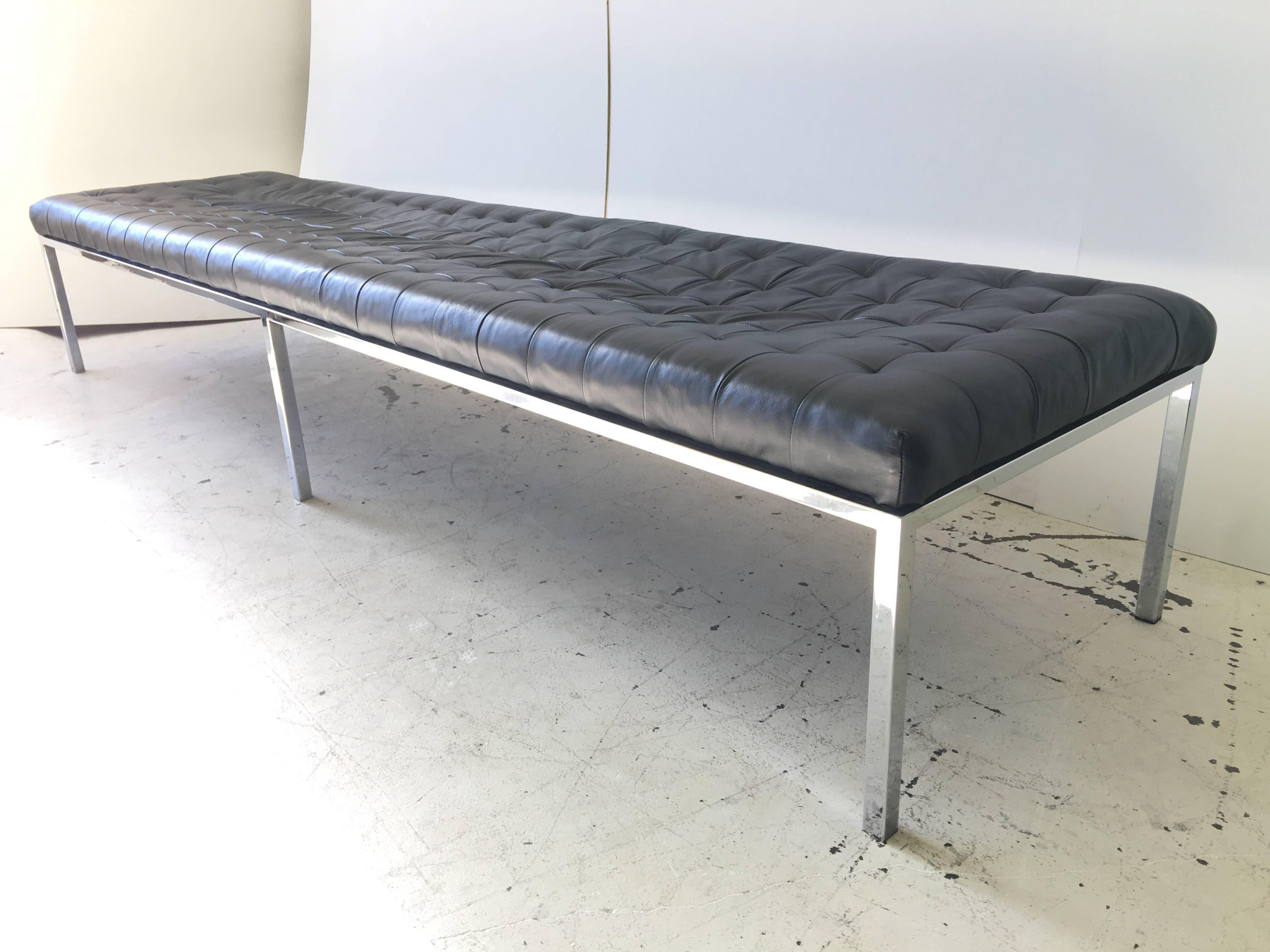 8 feet long! This is a fantastic large, leather tufted 