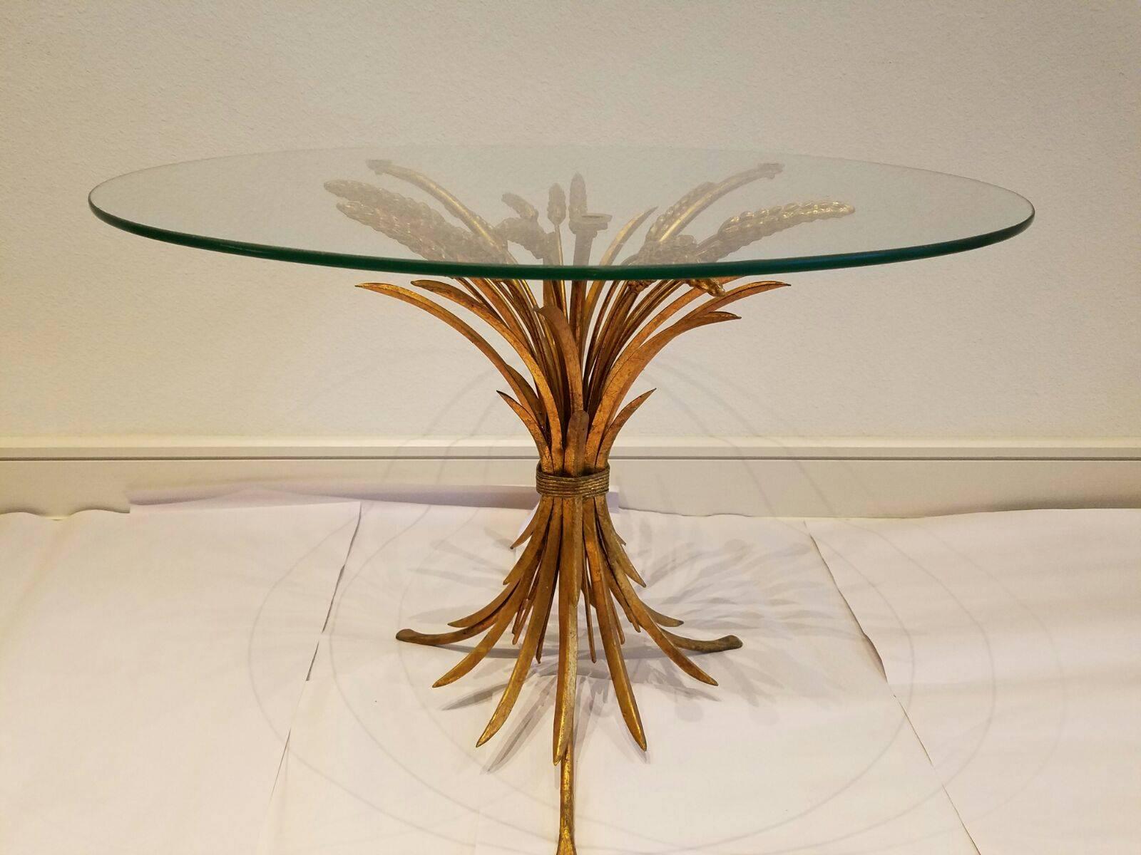  Beautiful Hollywood Regency gilded wheat sheaf accent table with glass top. Made in Italy in the 1960's. Lovely accent table..