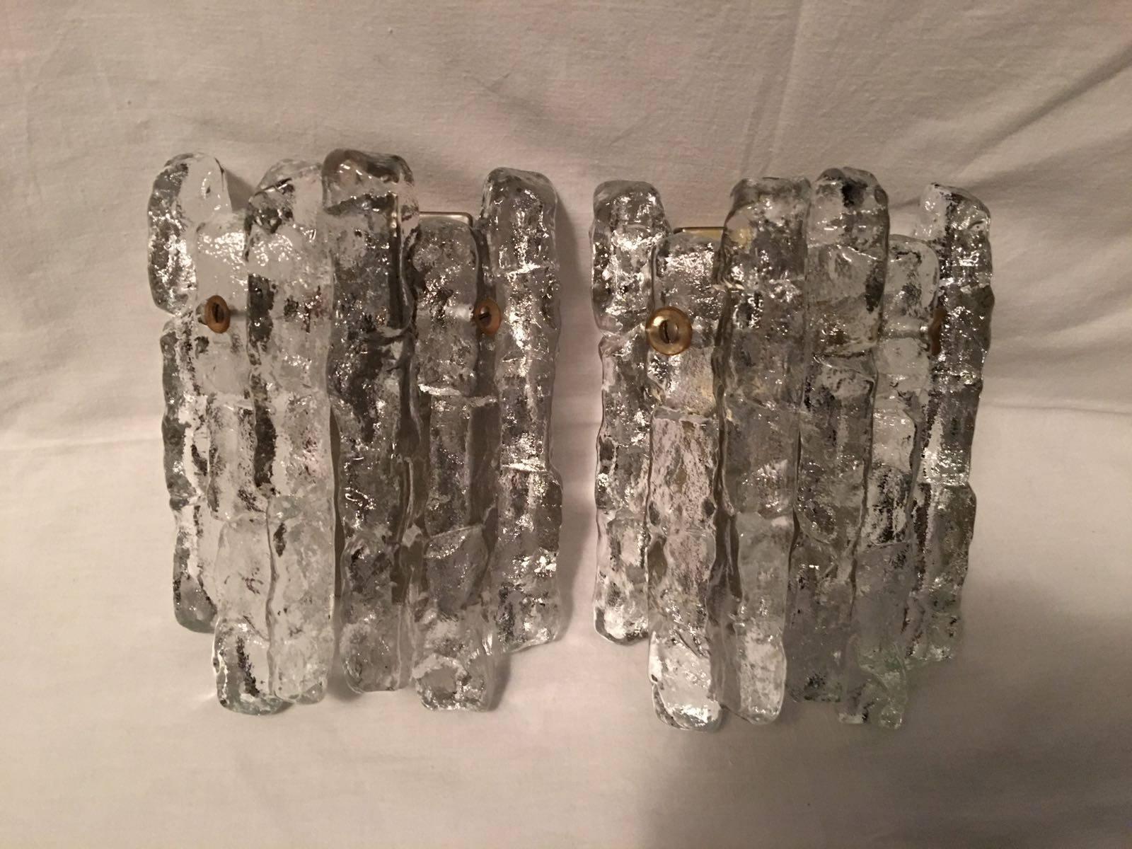 Excellent Kalmar ice glass wall sconces, each having two heavy pieces of ice glass. Petite size for smaller rooms. One E-14 base bulb per sconce up to 40 watts.