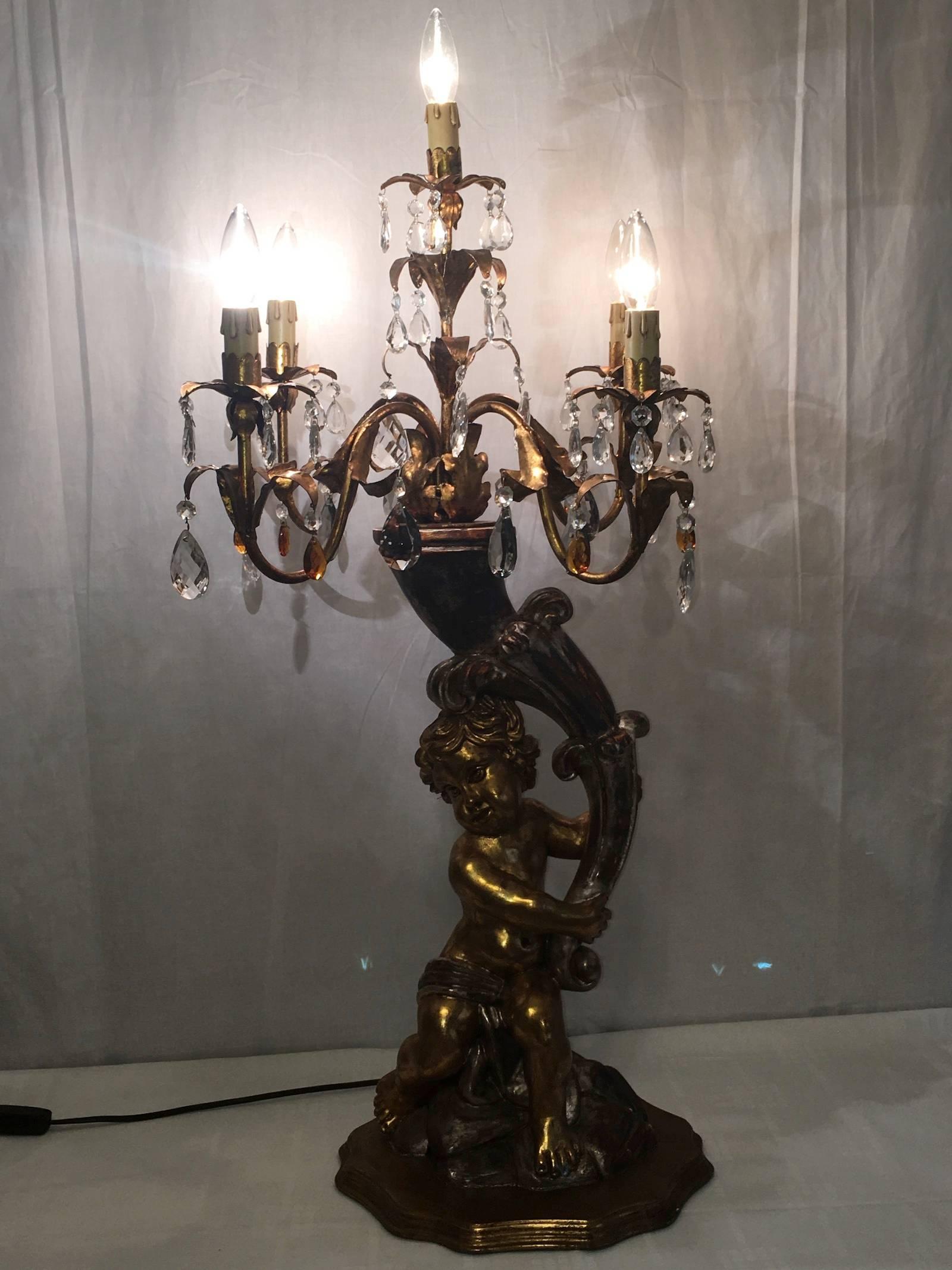 Mid-20th Century Hollywood Regency Style Cherub Angel Gilded Wood and Crystal Prism Table Lamp For Sale