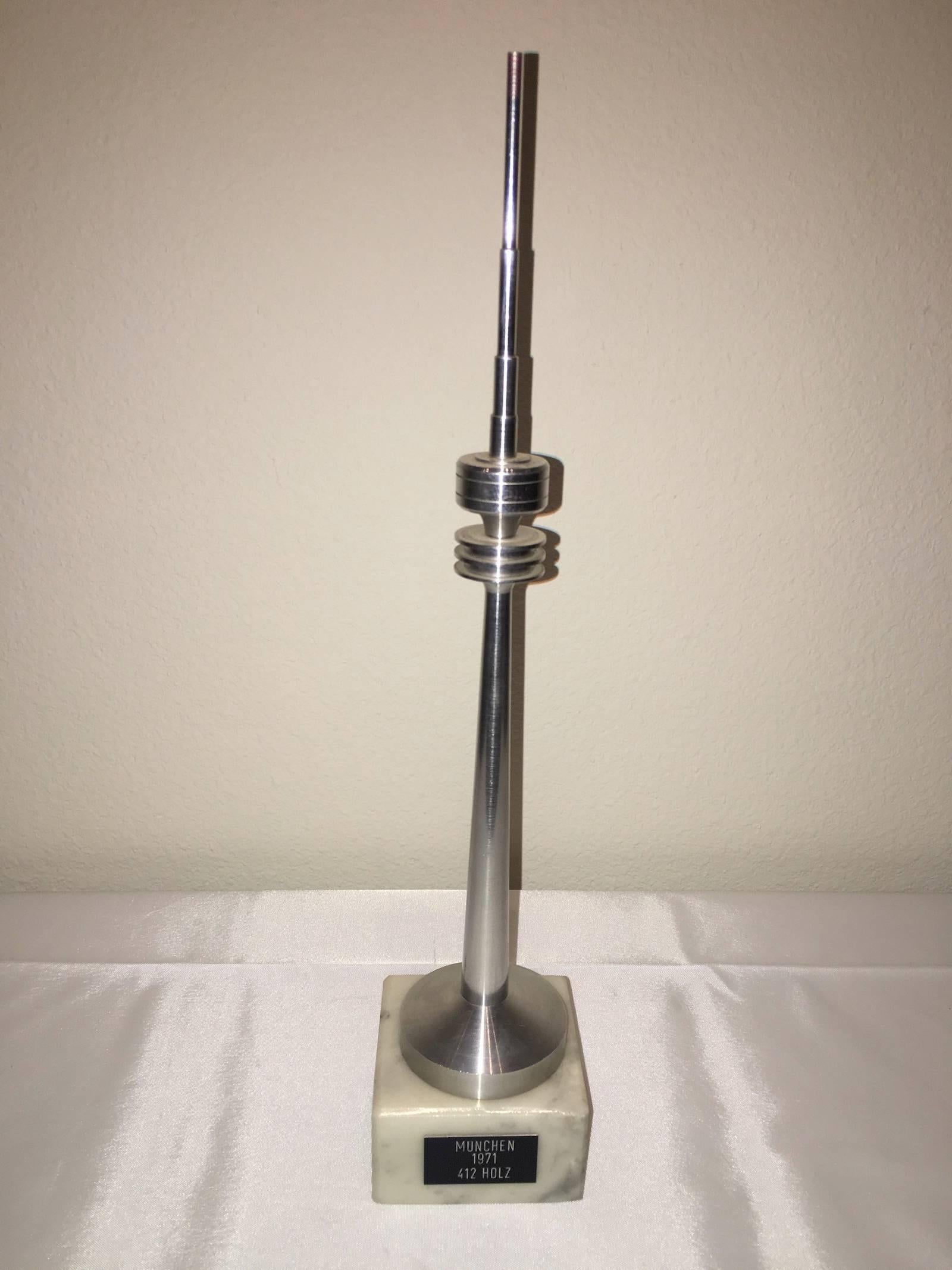 Scaled model of the Munich television tower. Hand-spun in aluminium, fixed on a marble Base. Nice conversation piece.
          