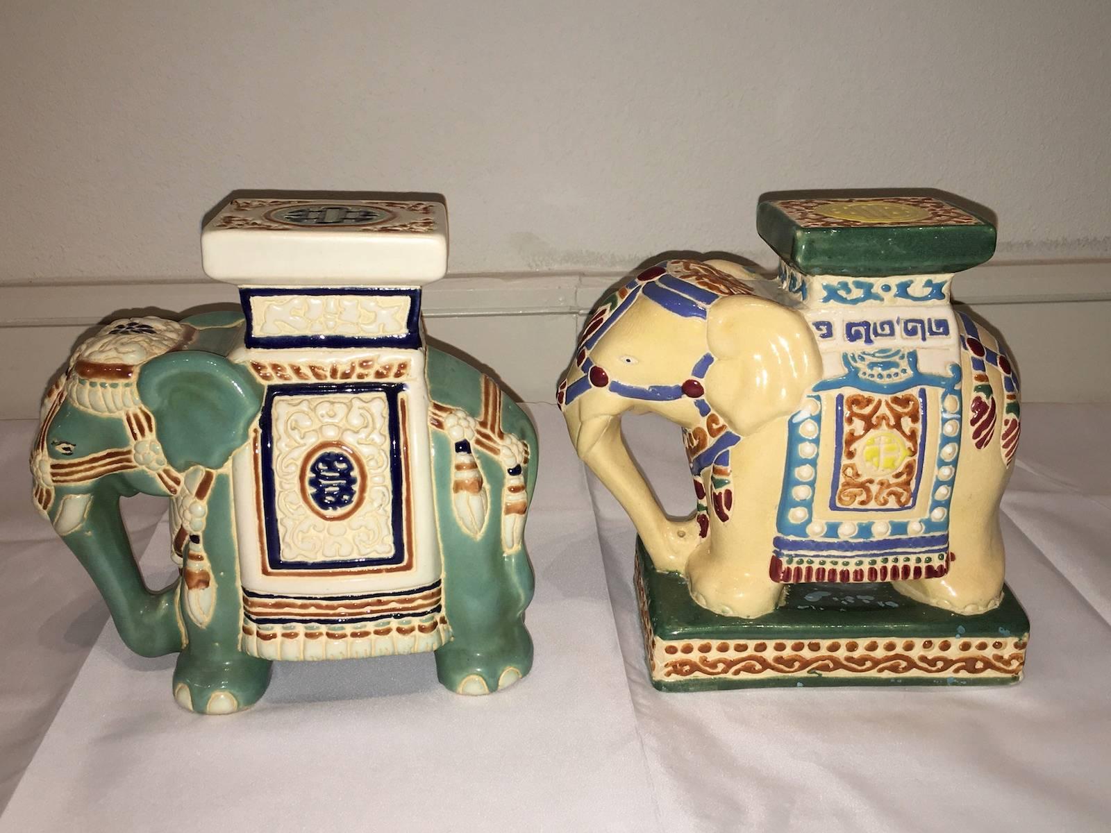 Lot of two mid-20th century glazed ceramic elephant bookends, plant stands, flower pot stand. Handmade of ceramic. Nice addition to your home, patio or garden. They vary a little in size, measurements given are for the tallest.