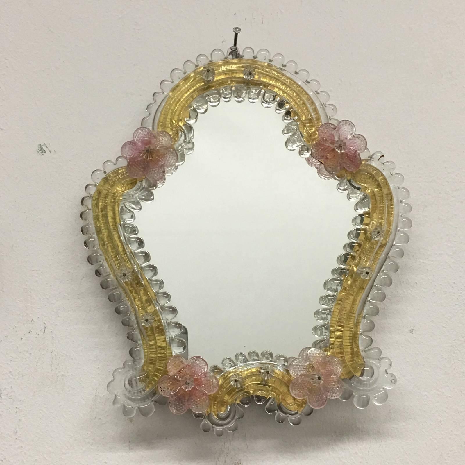 A pair of Petite Murano glass wall mirrors. Clear glass with gold foil backing. All have clear and pink flowers. Age, circa 1960s.