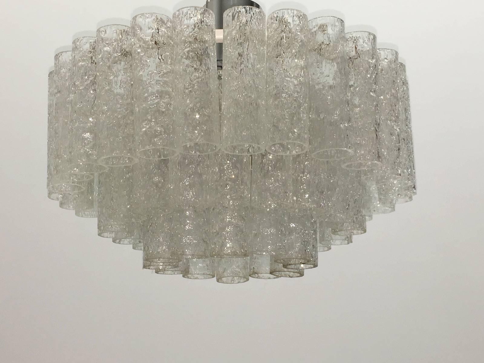 Mid-Century Doria chandelier flush mount, three rings of glass cylinders. The fixture requires six European E14 candelabra bulbs, each bulb up to 40 watts and one E27 Edison bulb up to 75 watt.