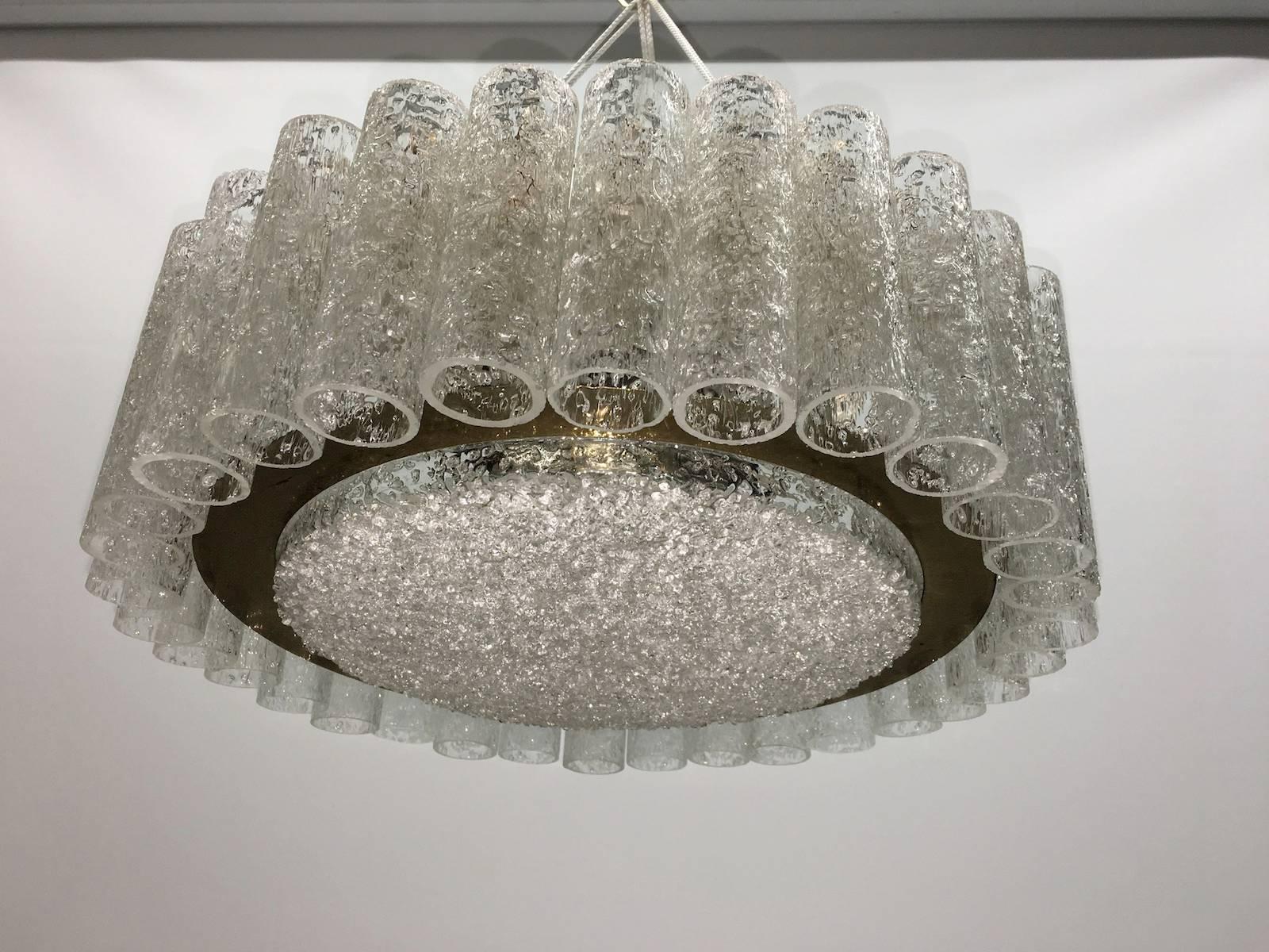 Mid-Century Doria chandelier, structured glass surrounding a brass ring and granulated glass disc. The Fixture requires 6 European E27 Edison bulbs, each bulb up to 60 watts.