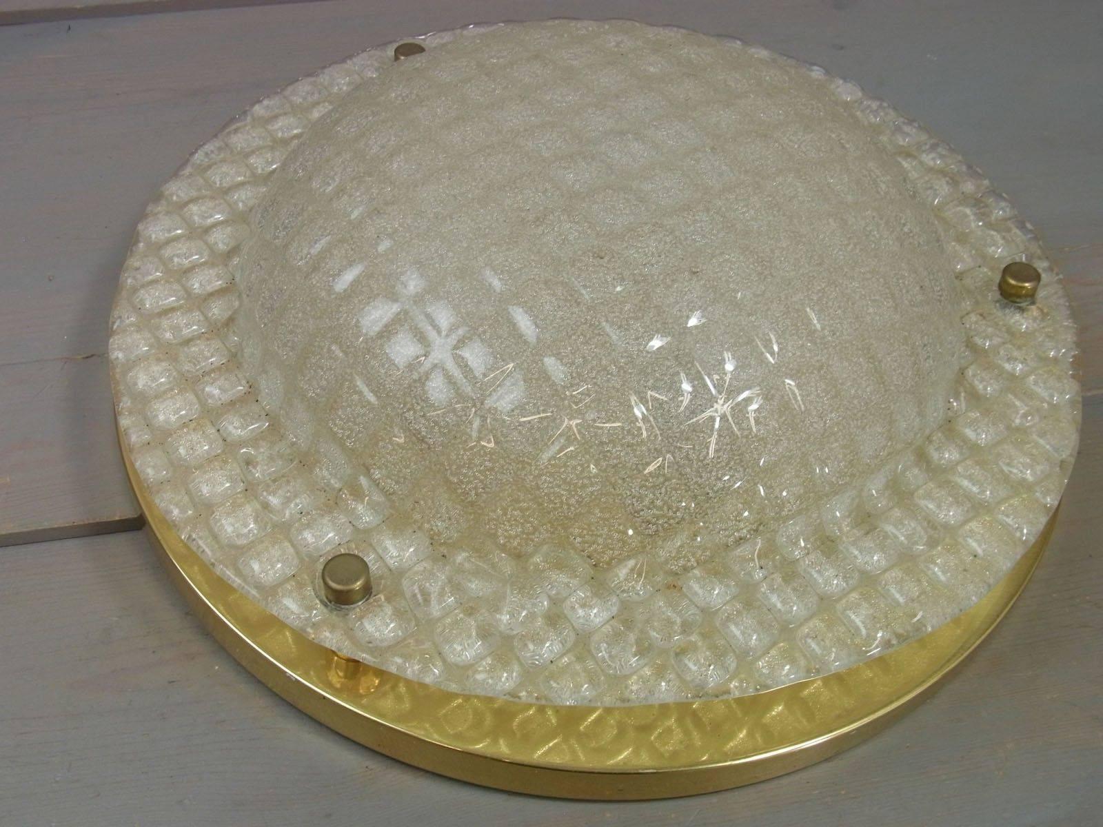 Mid-Century flush mount, thick textured glass. Made by Fischer Leuchten, Germany. The fixture requires three E27 edison bulb up to 60 watt each bulb.