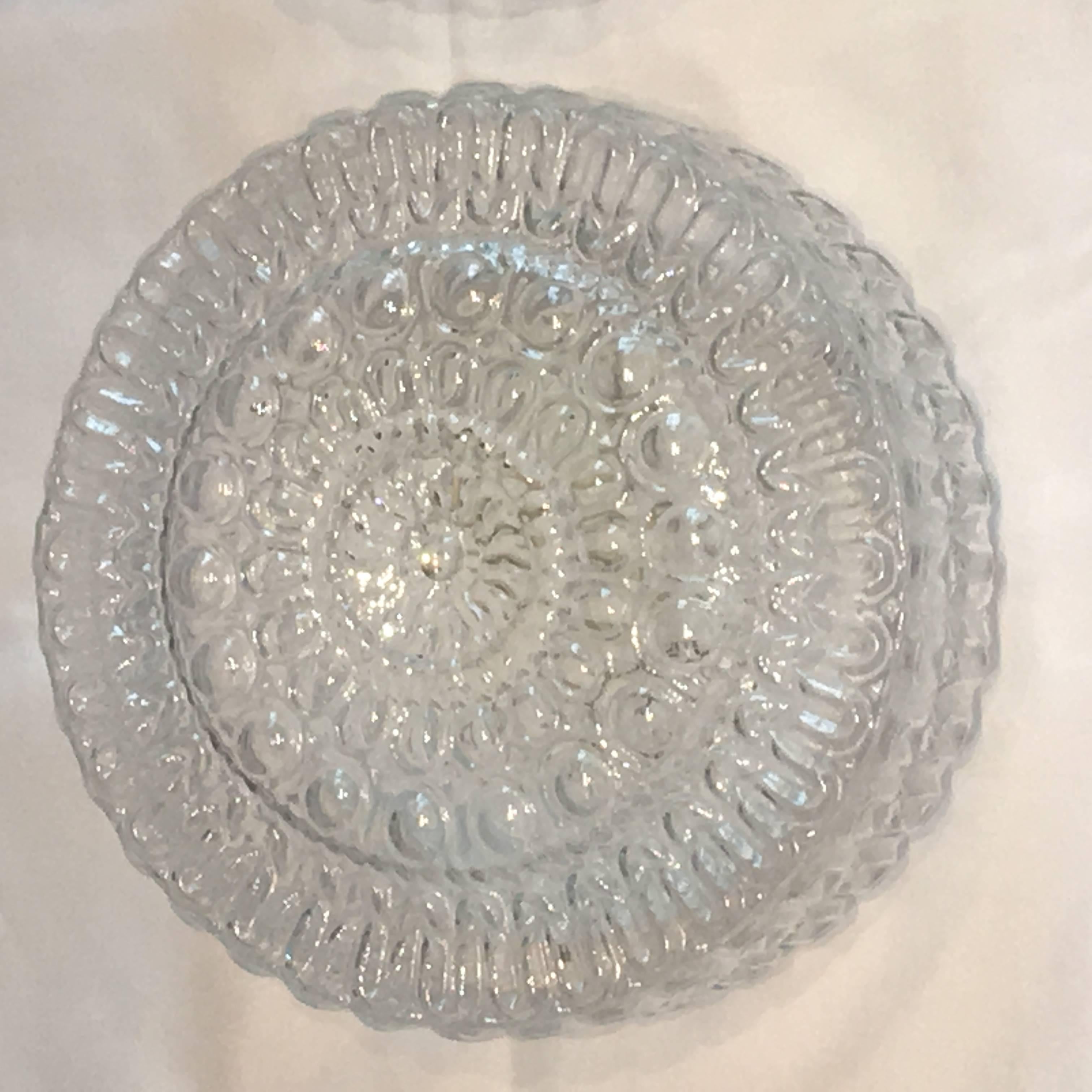A pair of beautiful flush mount. Made in Germany. Gorgeous textured glass. Flush mount with metal fixture. Each fixture requires one European E27 Edison or medium bulb up to 60 watts.
  
