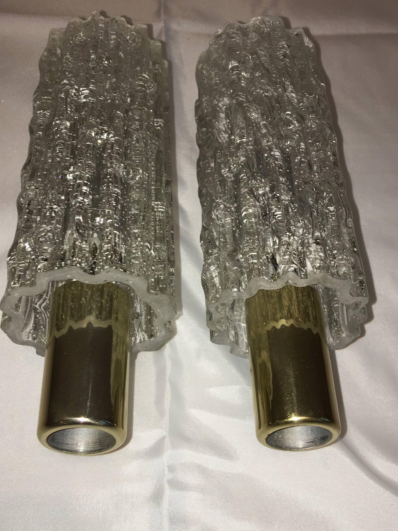 Pair of circa 1960s German one tube Doria glass sconces with interior lights. Each fixture requires one European E14 candelabra bulbs, each bulb up to 40 watts.