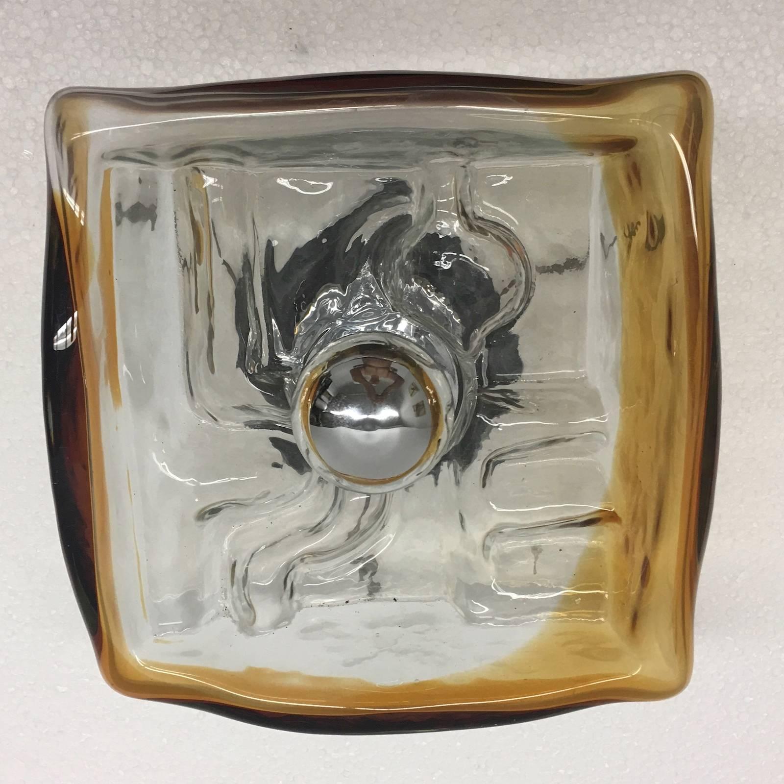 Cool looking 1960's clear and amber square sconce or flush mount ceiling light. The fixture requires one European E27 Bulb, up to 100 watts. For maximum lighting effect use it with a silver or gold-plated glass bulb. Great Ambiance. 