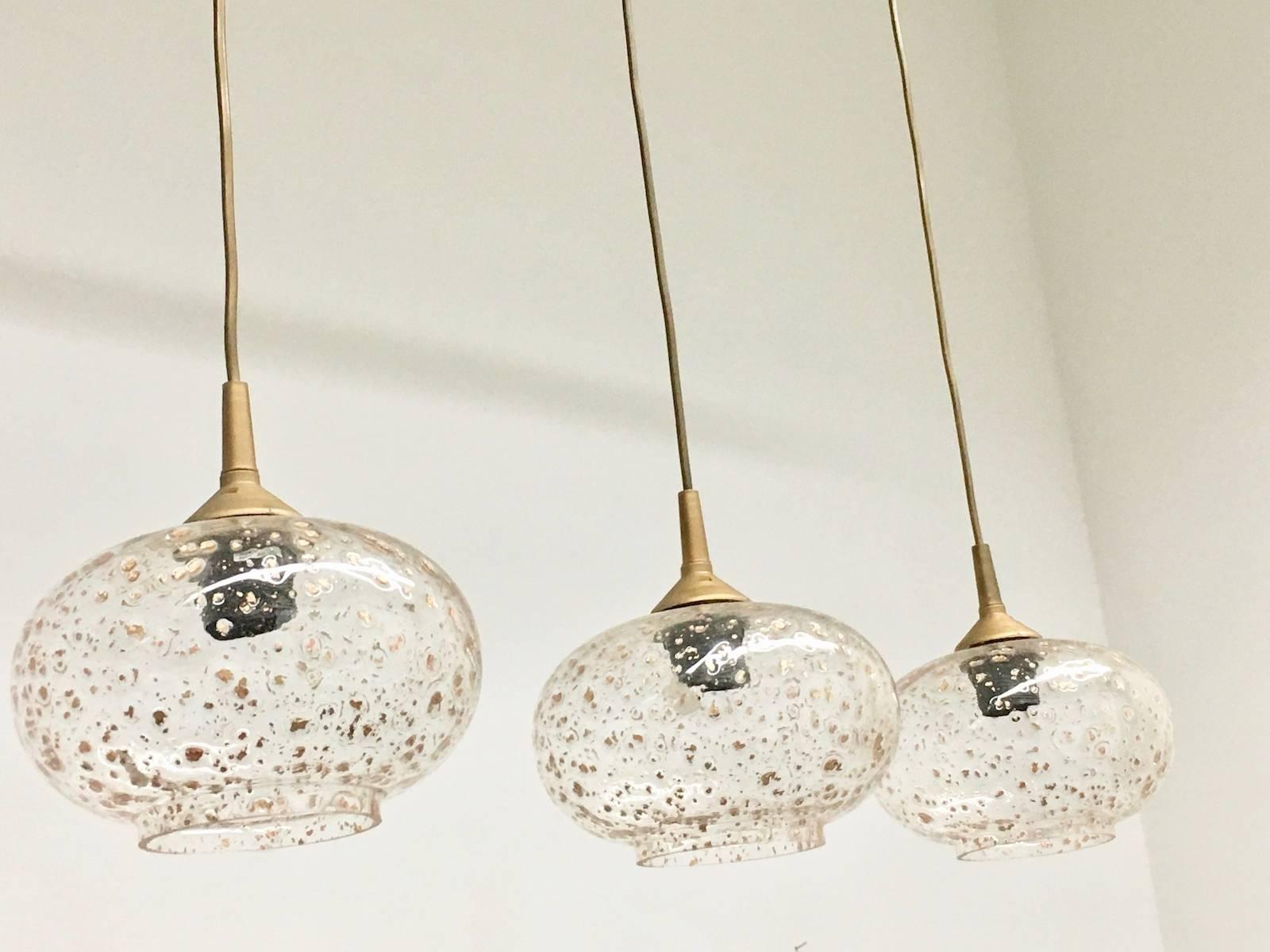 German Lot of Five Gold Flake Ball Glass Kitchen Island Pendant Lights For Sale