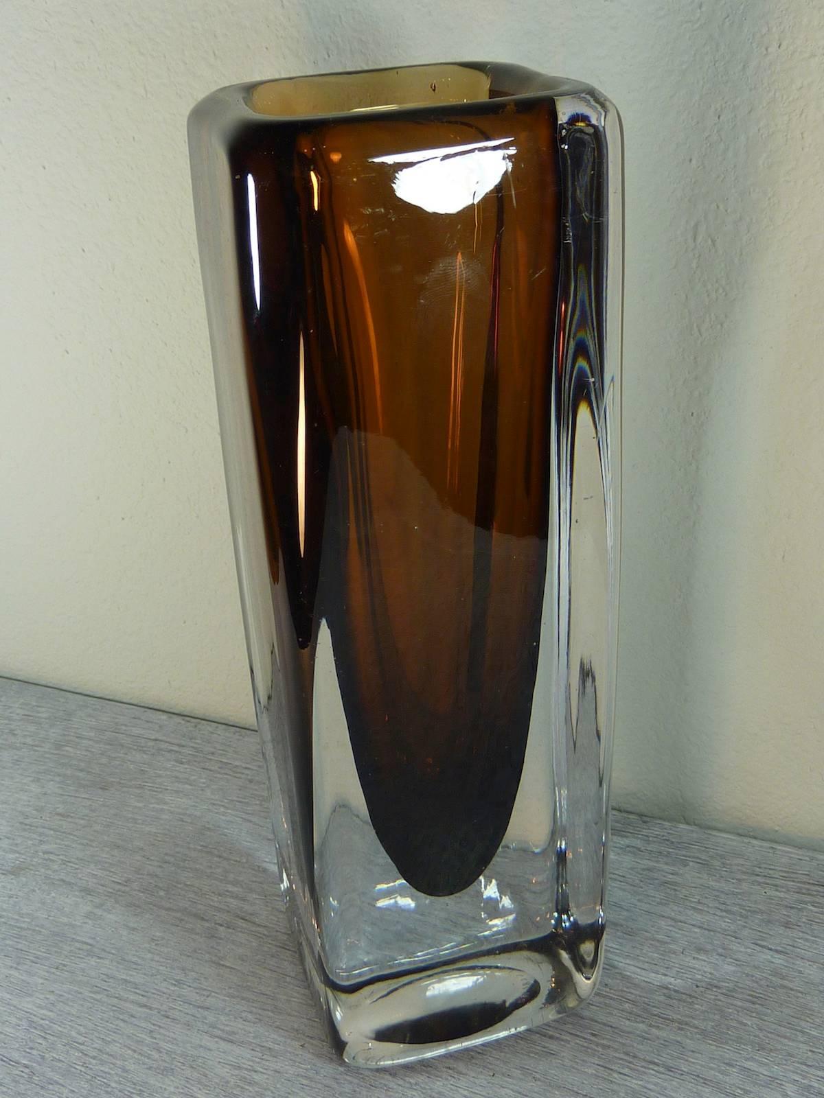 Vintage Kosta Boda glass vase, dating, circa 1970s. Beautiful clear and brown color. Signed Kosta and Number on the bottom. Very heavy!