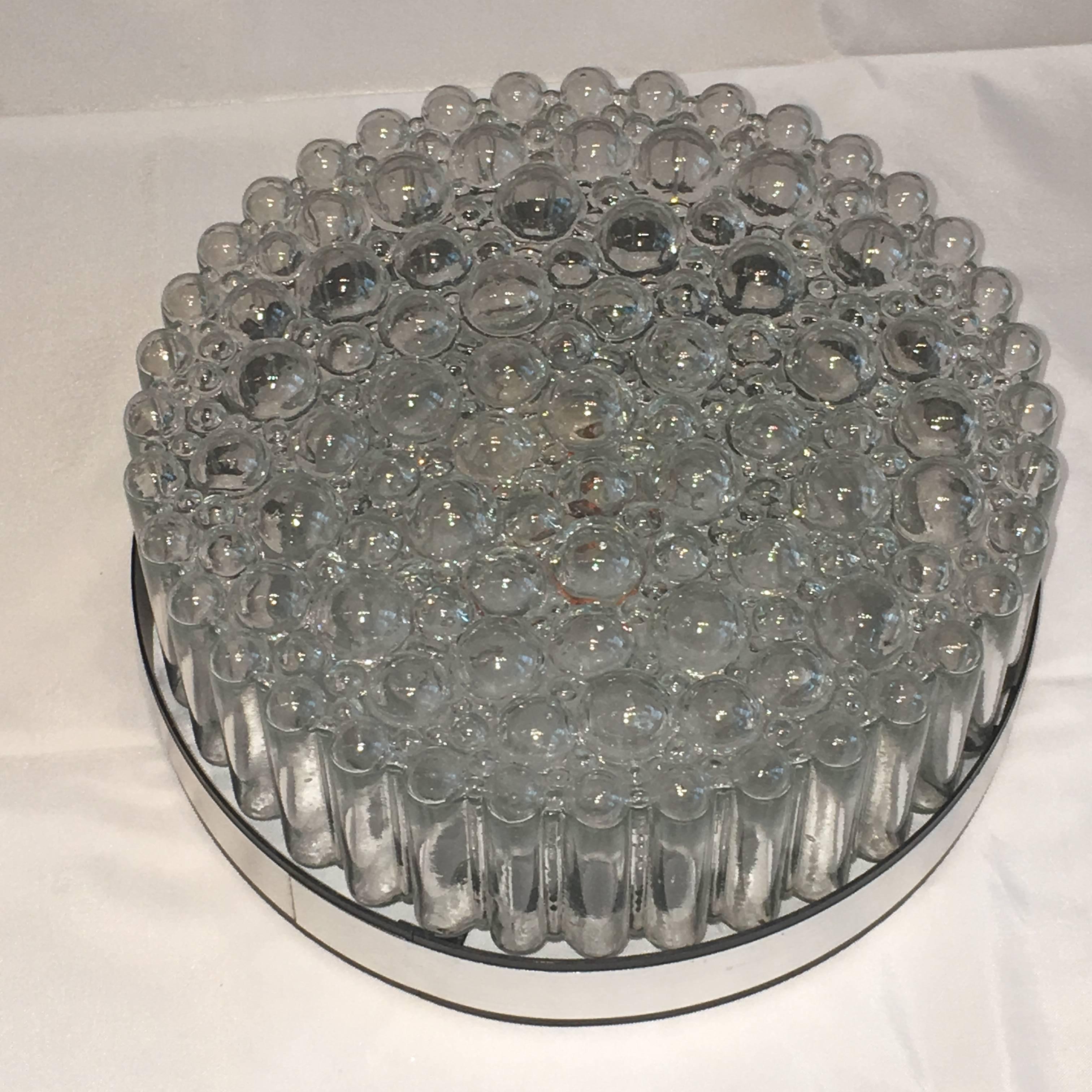 A beautiful flush mount. Made in Germany. Gorgeous textured glass. Flush mount with metal fixture. The fixture requires one European E27 Edison or medium bulb up to 60 watts.