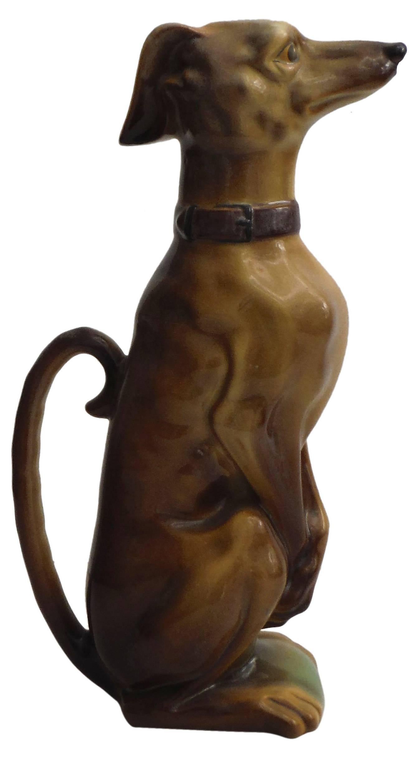 Antique tall Majolica whippet pitcher named Gypp circa 1900 signed Keller and Guerin for the manufacture of Saint Clement.
Reference : Pge 41 