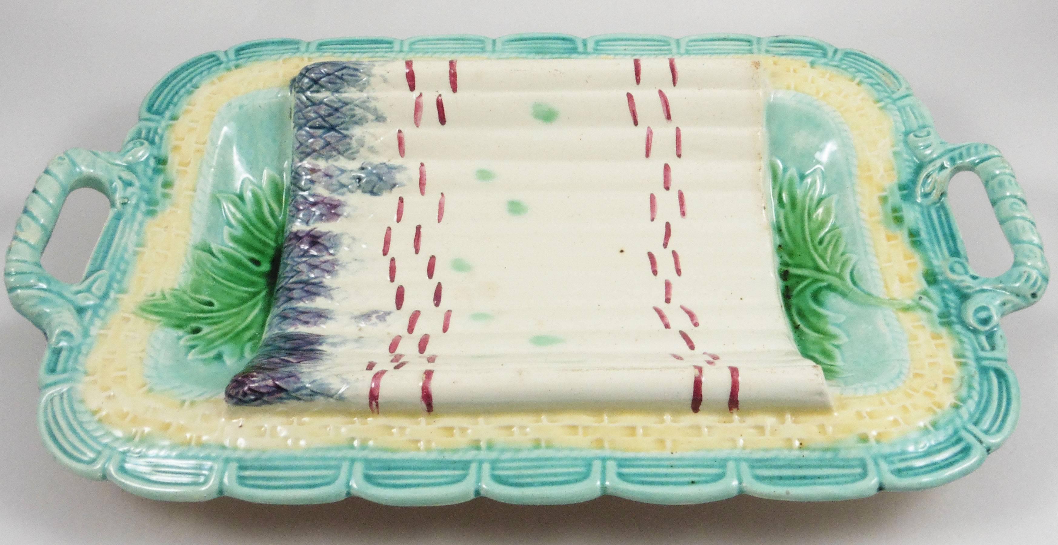19th Majolica Asparagus handled platter salins, in a shape of basket Trompe l'oeil.
 