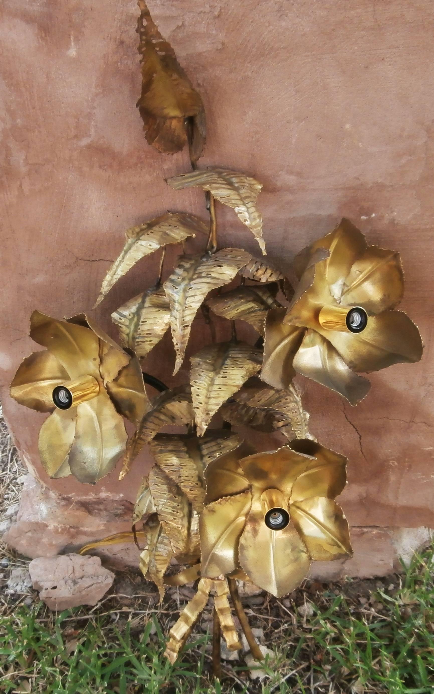 Large metal sconce with flowers and leaves, circa 1960.
Electrified and wired USA.