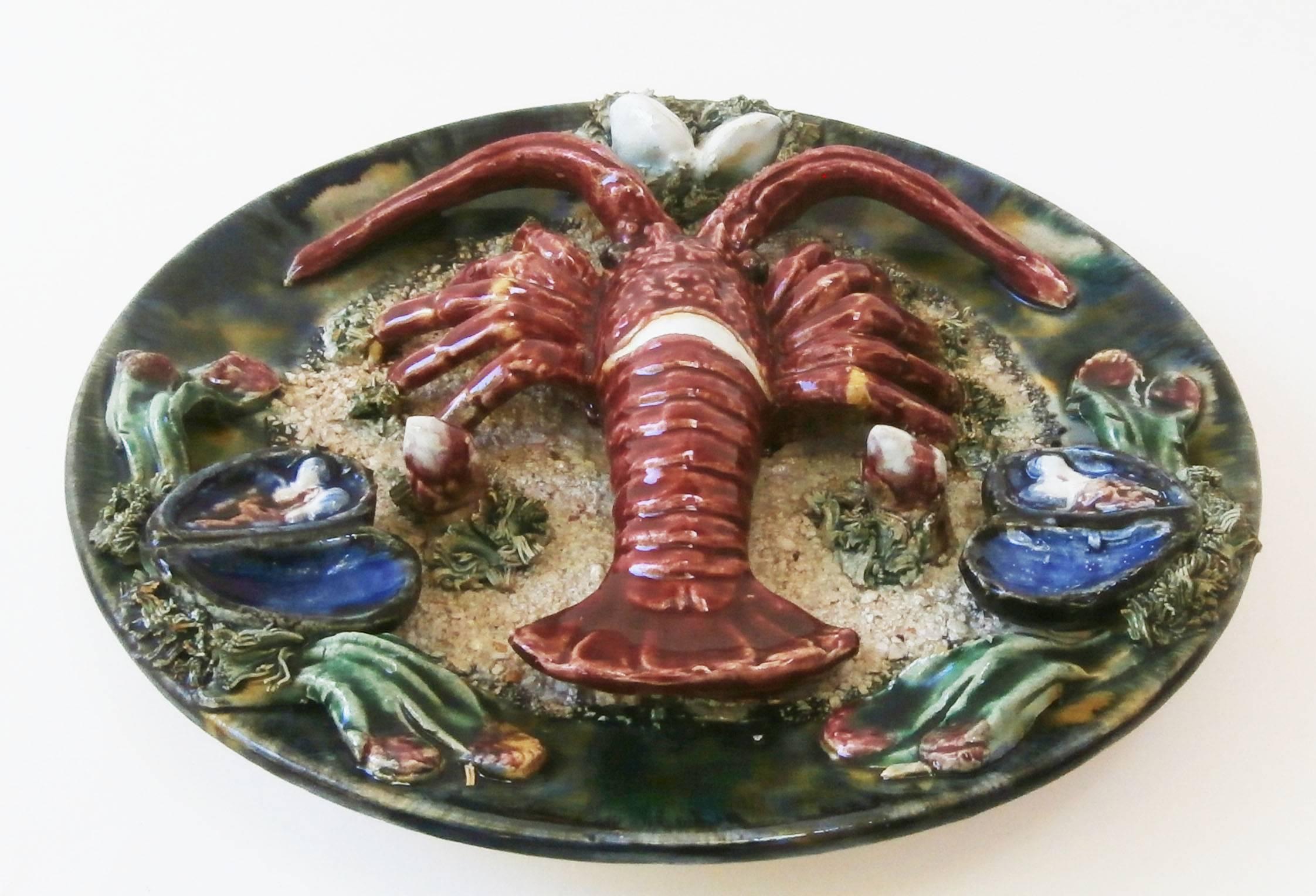 Large Majolica Portuguese Palissy lobster platter with seaweeds and shells signed Caldas de Rainha, circa 1940.
