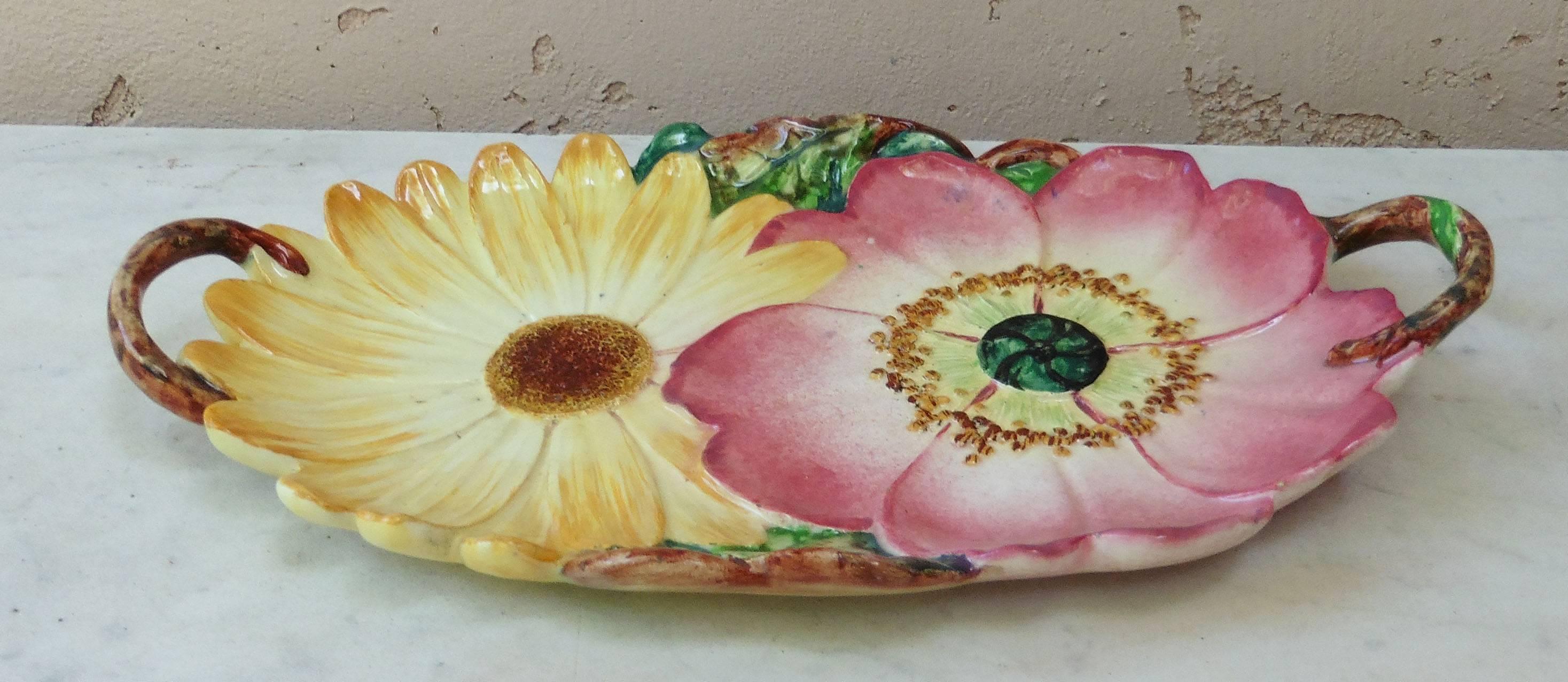 Antique Majolica handled platter with wild rose and sunflower unsigned Massier, circa 1890.
