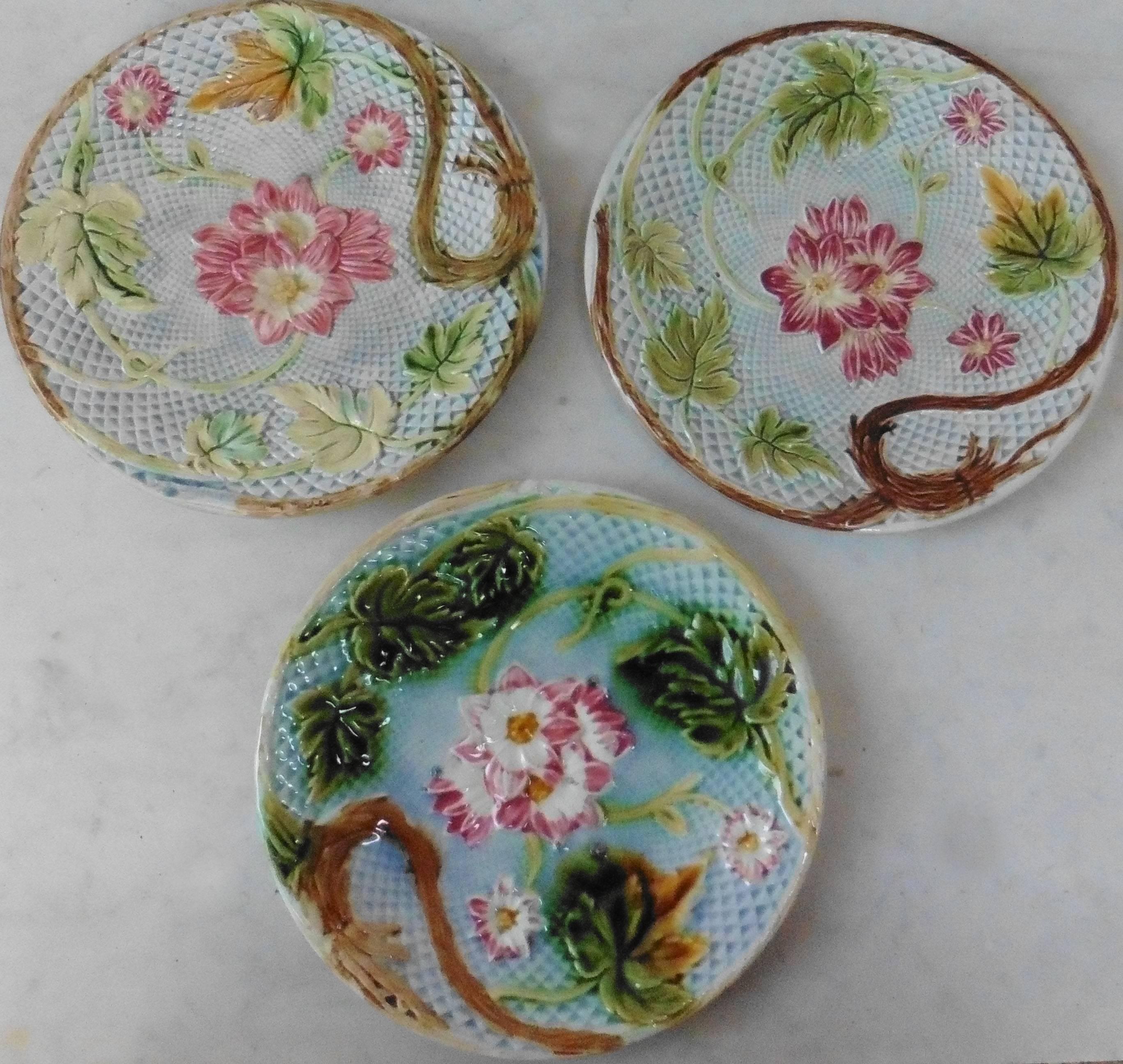 Lovely French Majolica plate pink flowers on a blue basketweave, circa 1880 attributed to Salins.