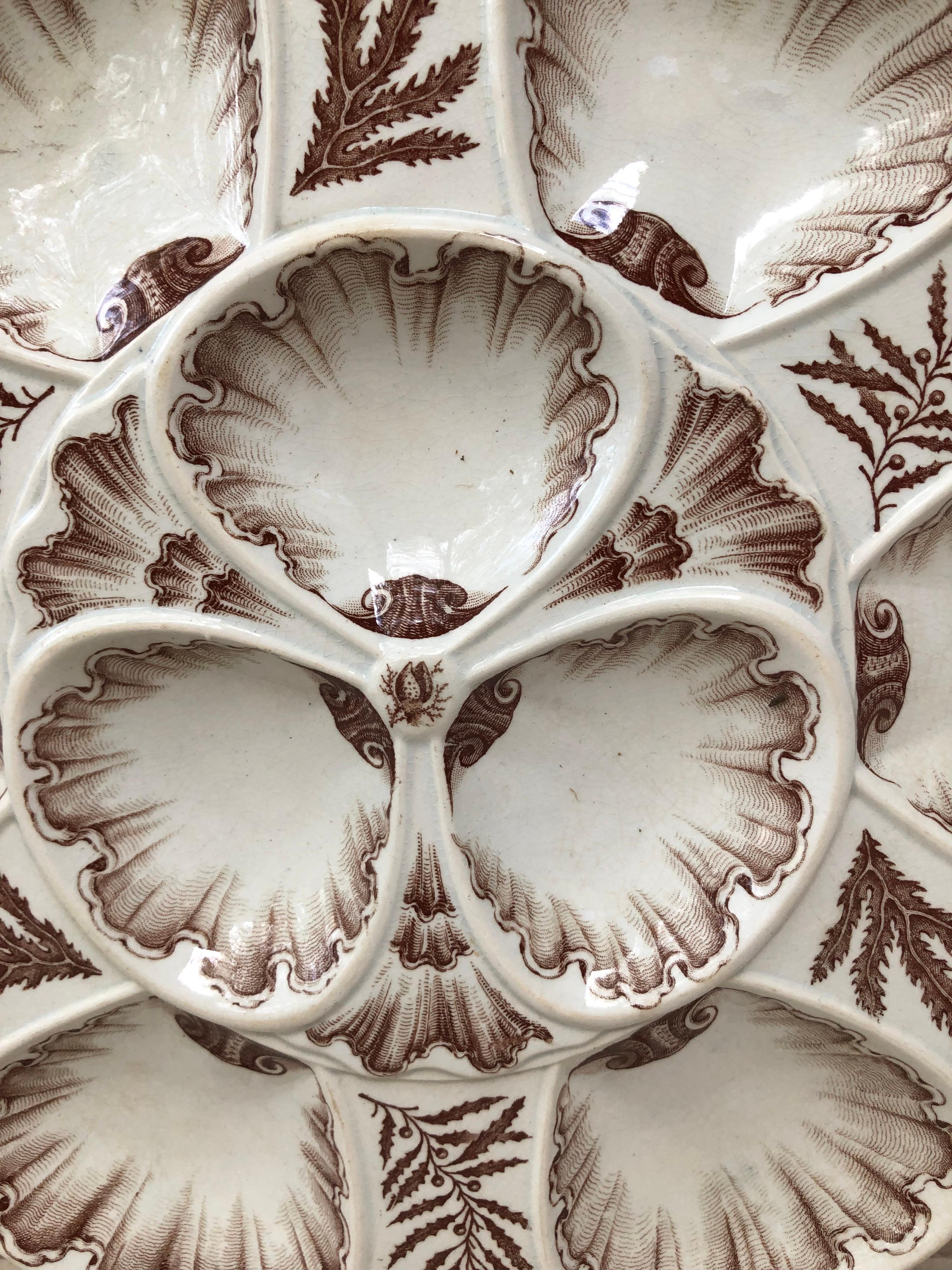 Rare brown 19th faience oyster plate signed Vieillard Bordeaux usually found in blue in white.