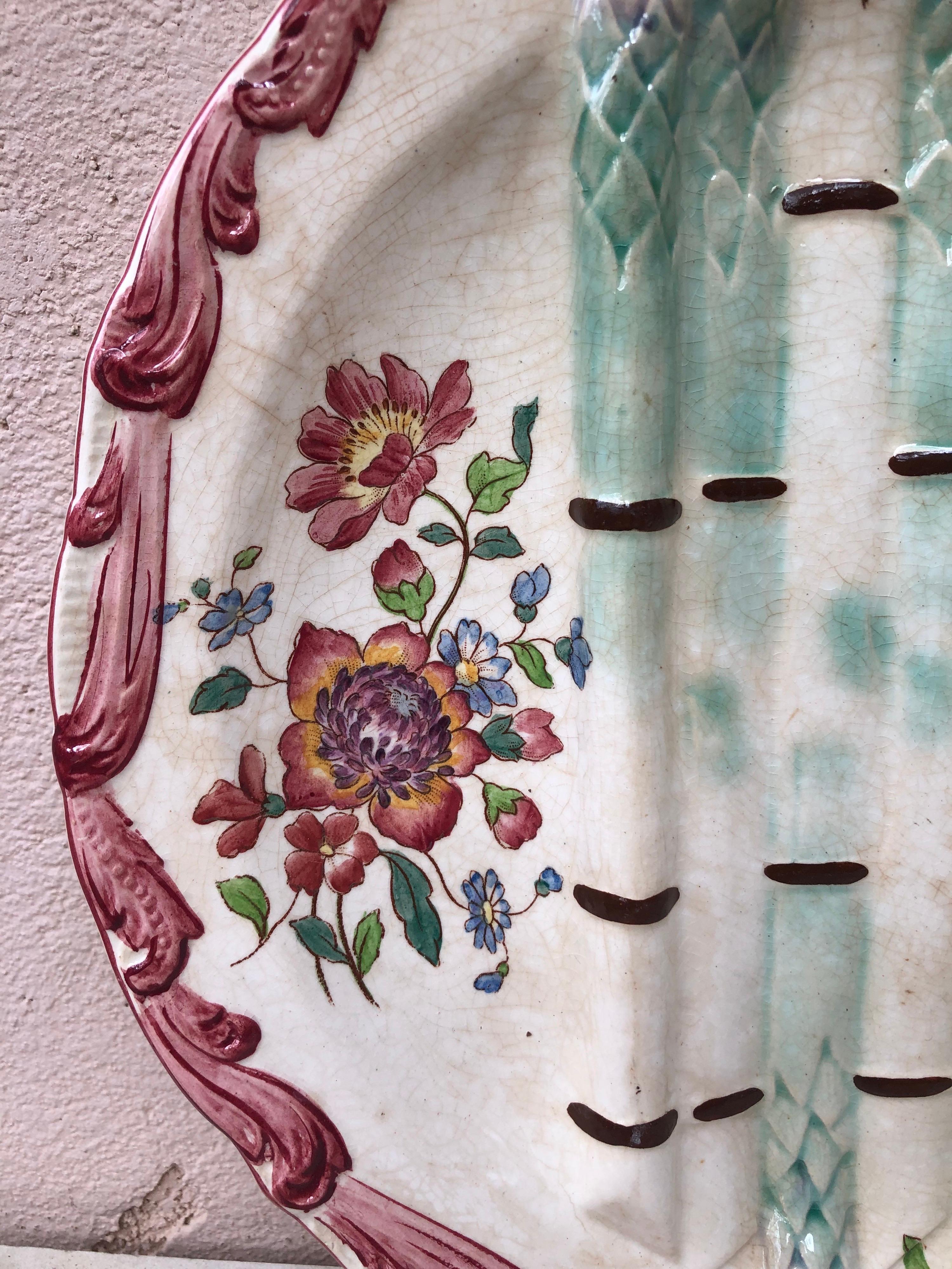 Majolica asparagus plate with flowers, each plate have differents flowers signed Longchamp, circa 1890.
