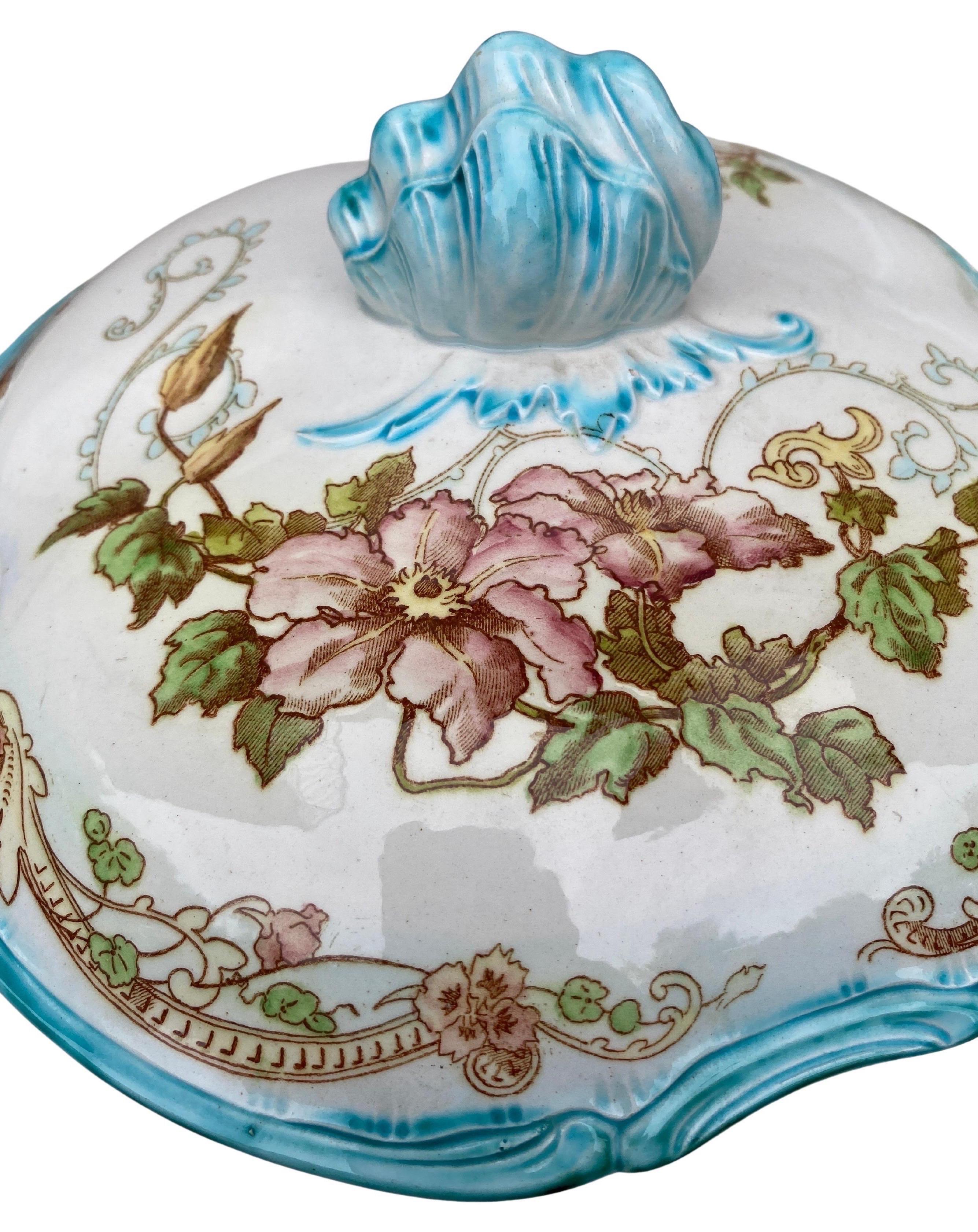 French Faience Saint Cloud Tureen signed Creil et Montereau Circa 1890.
Painted roses and wild roses , shell handle.
Saint-Cloud is a commune in the western suburbs of Paris, France, 9.6 kilometres (6.0 miles) from the centre of Paris.