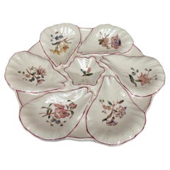 Piatto da ostrica in maiolica Flowers Longchamp, 1900 circa
