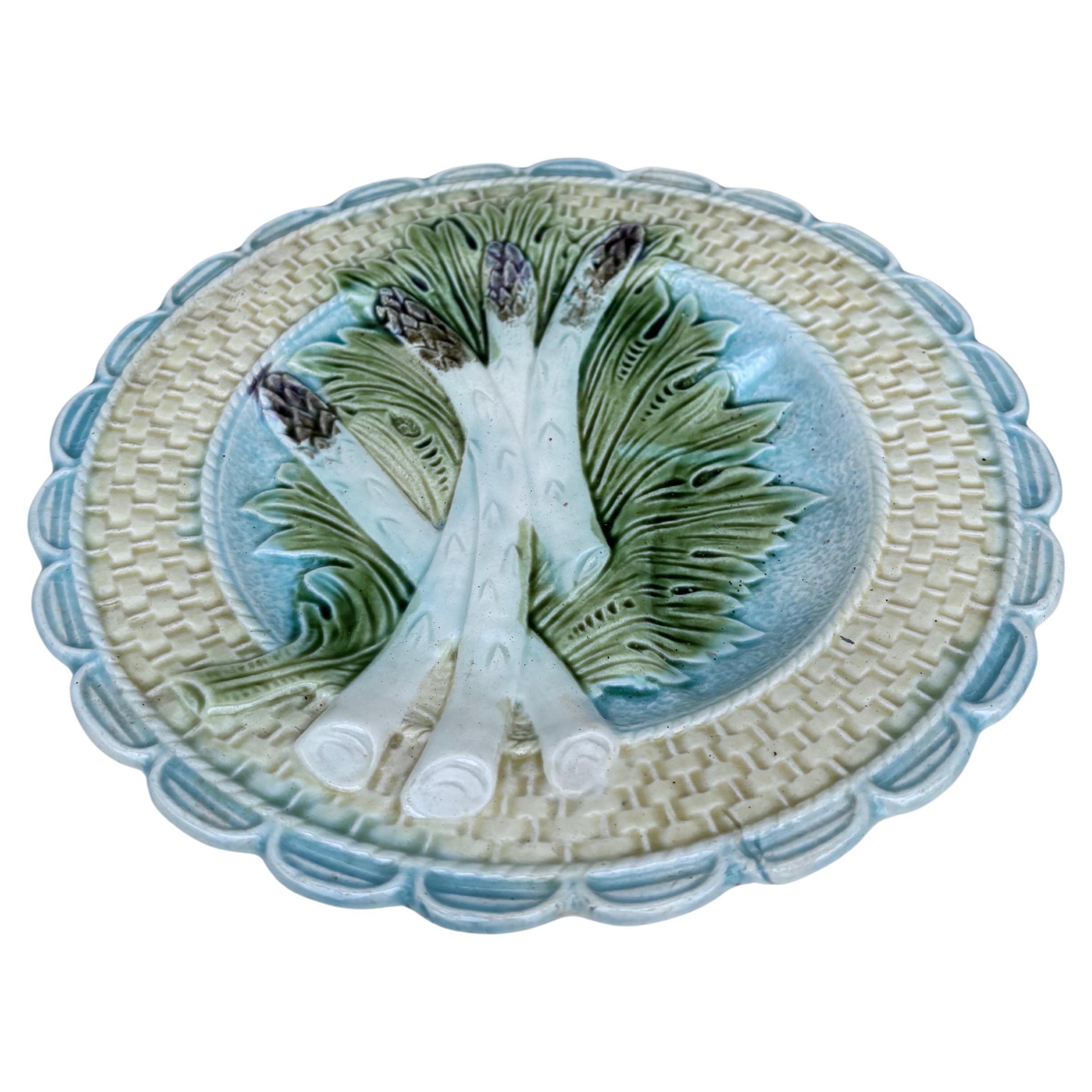 Colorful Majolica asparagus and artichoke plate Salins, circa 1890.
  