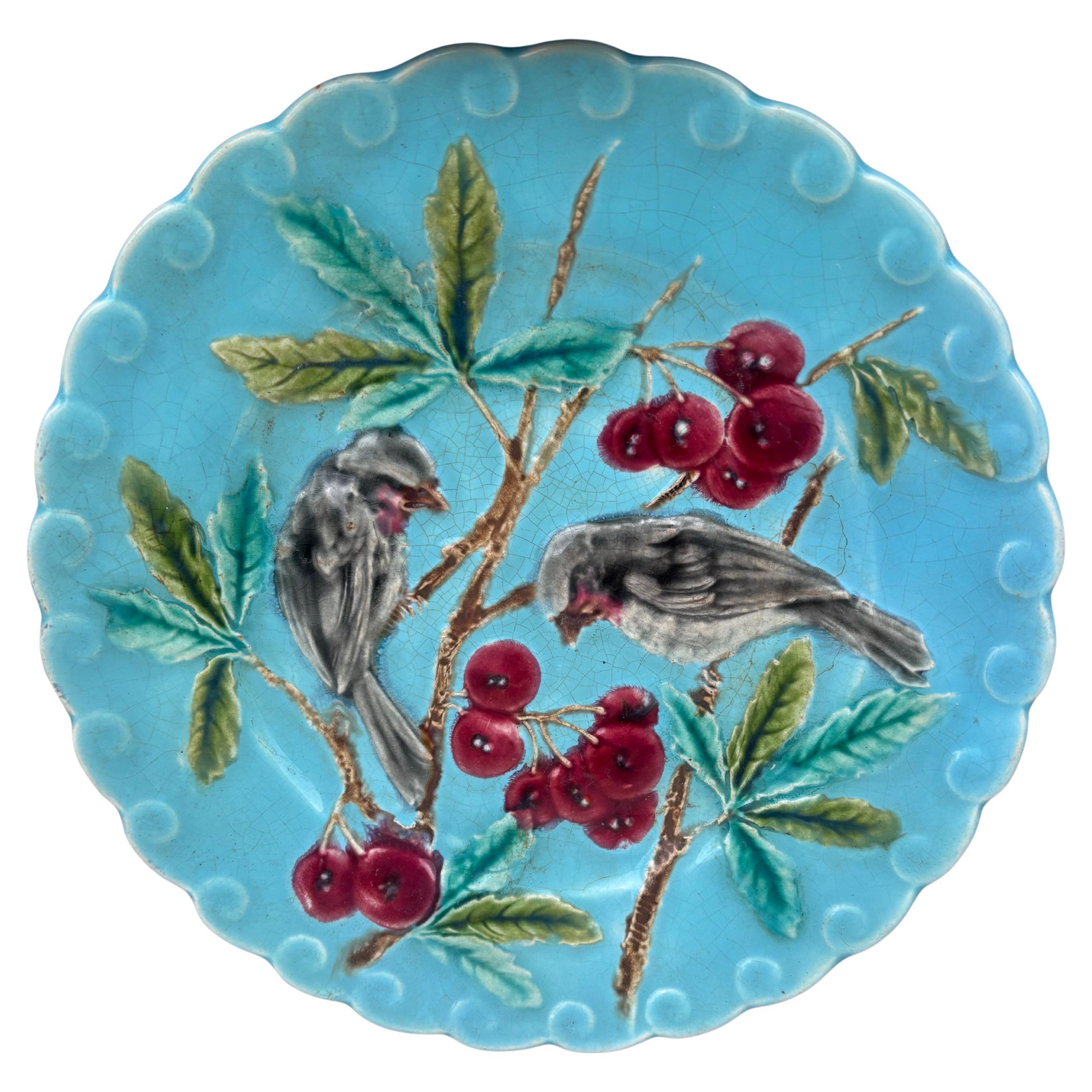 French Majolica bird with cherries aqua plate Sarreguemines, circa 1880.